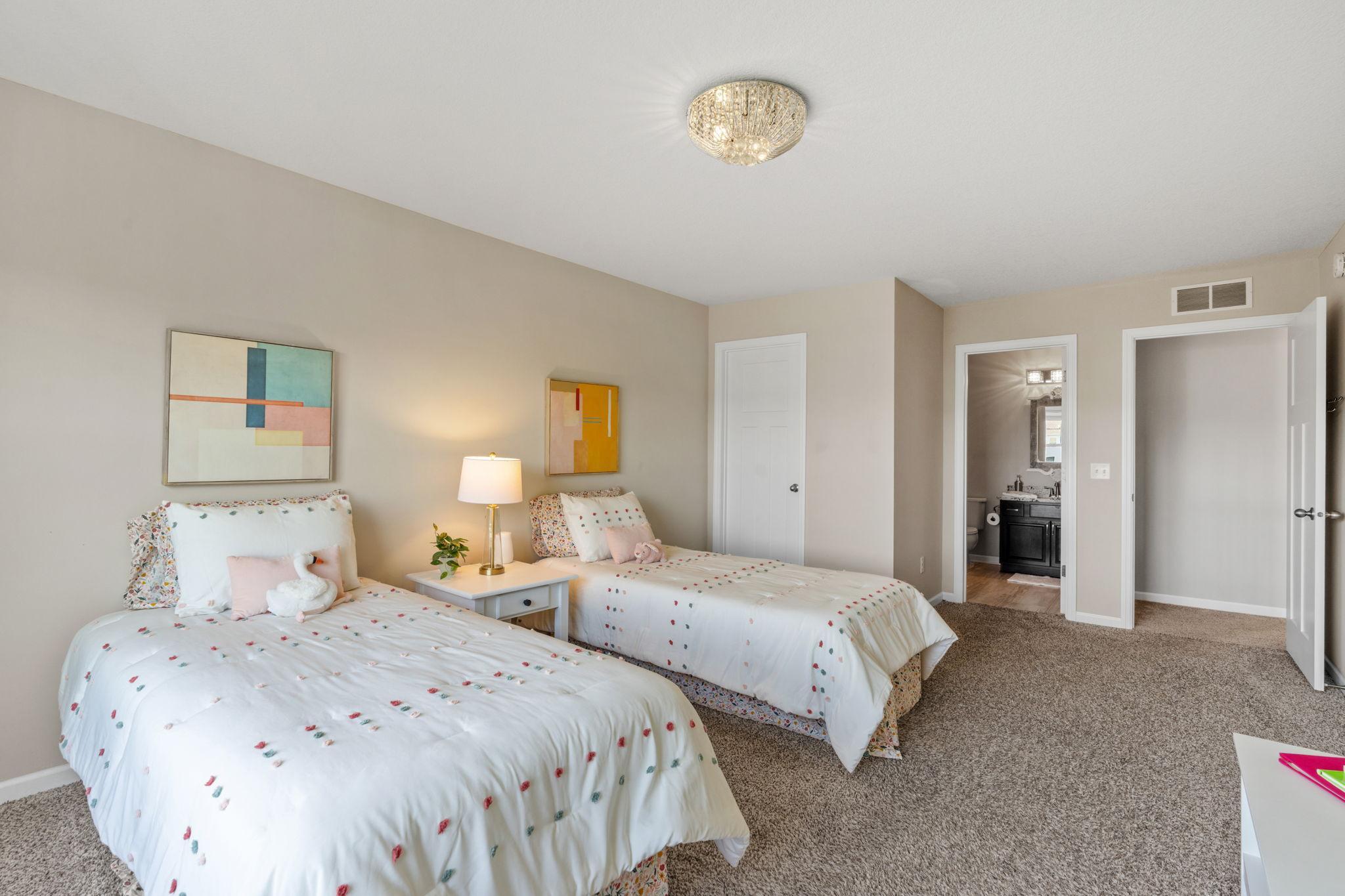 The expansive layout of the fourth bedroom easily accommodates two twin beds or a full-sized furniture suite with plenty of room to play.
