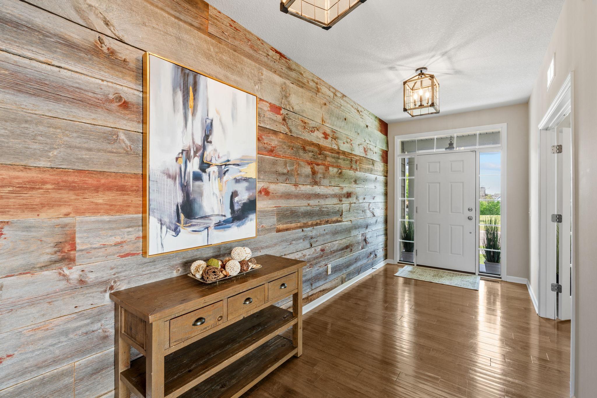 The bright, wide entrance gallery offers an immediate wow-factor with plenty of space for a console table and decorative artwork.