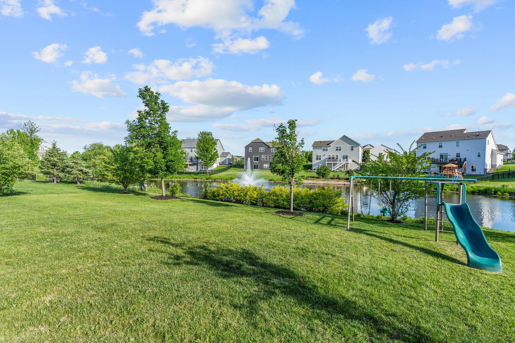 Large green spaces accommodate play structures effortlessly, allowing you to relax outside with water views as your backdrop.