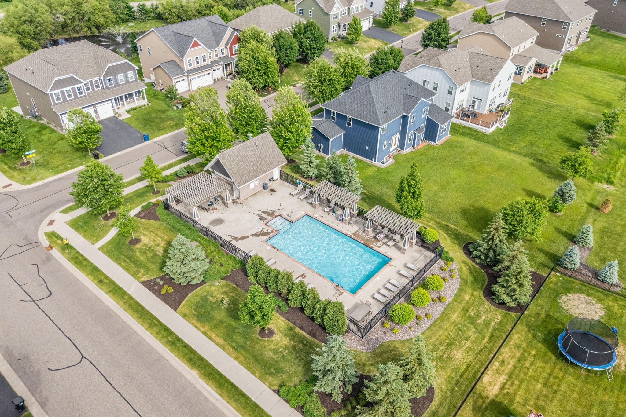 Enjoy access to a pristine association pool, patio area, and pergolas just steps away—perfect for relaxing and gathering during hot summer days.