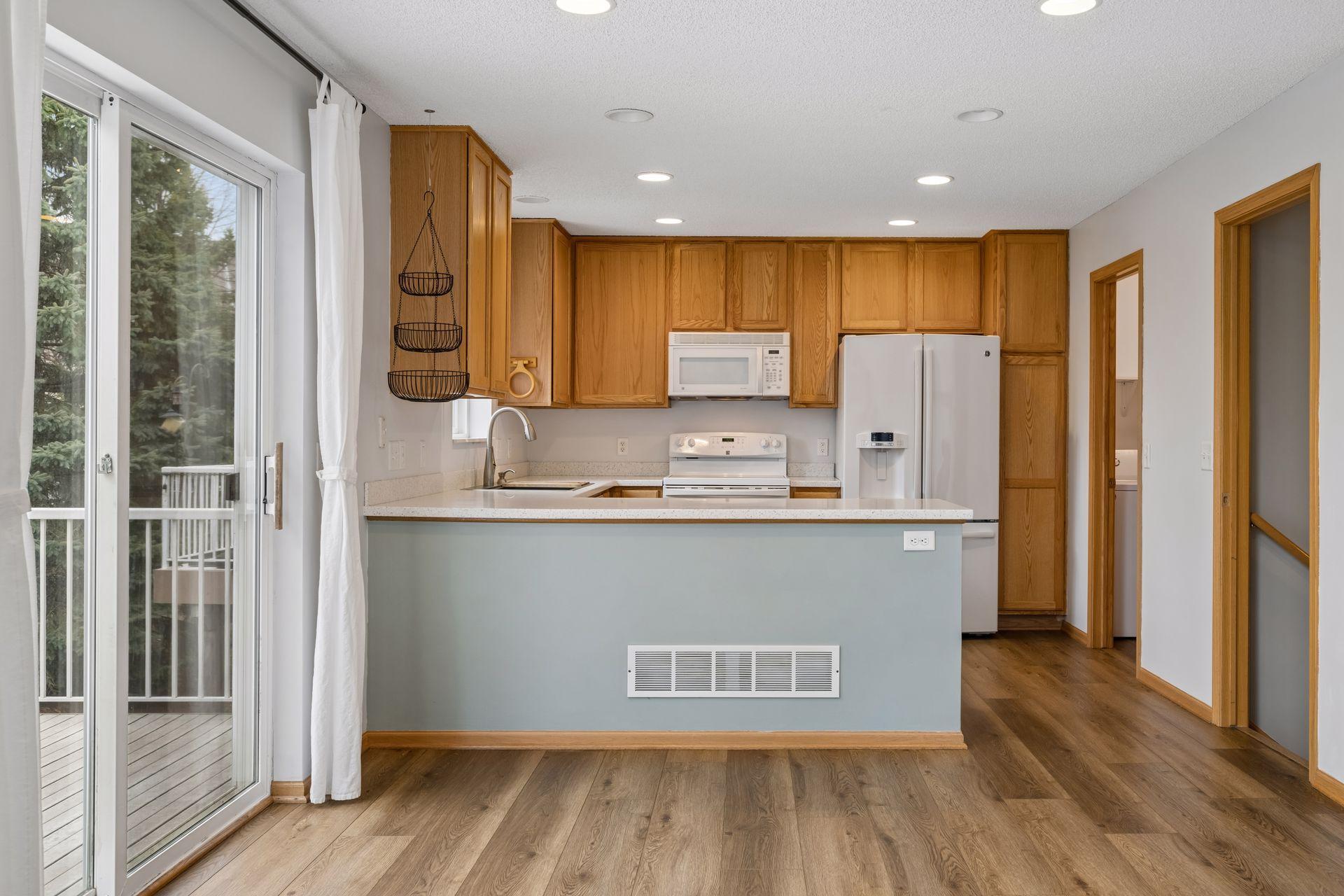 Your kitchen is open to the informal dining area, family room, and deck.