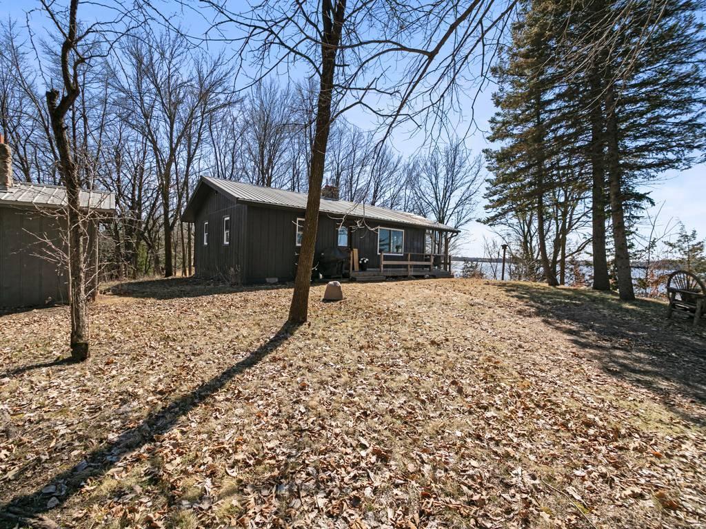 The cutest cabin situated on just over an acre lot