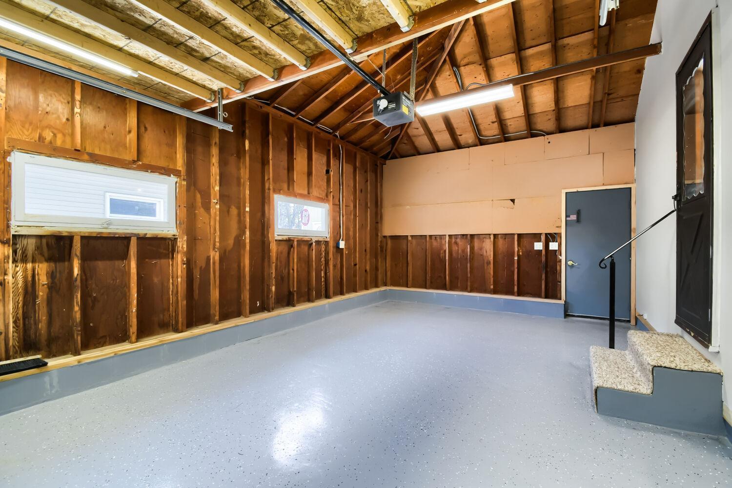 Inside the spotless garage with epoxy floors