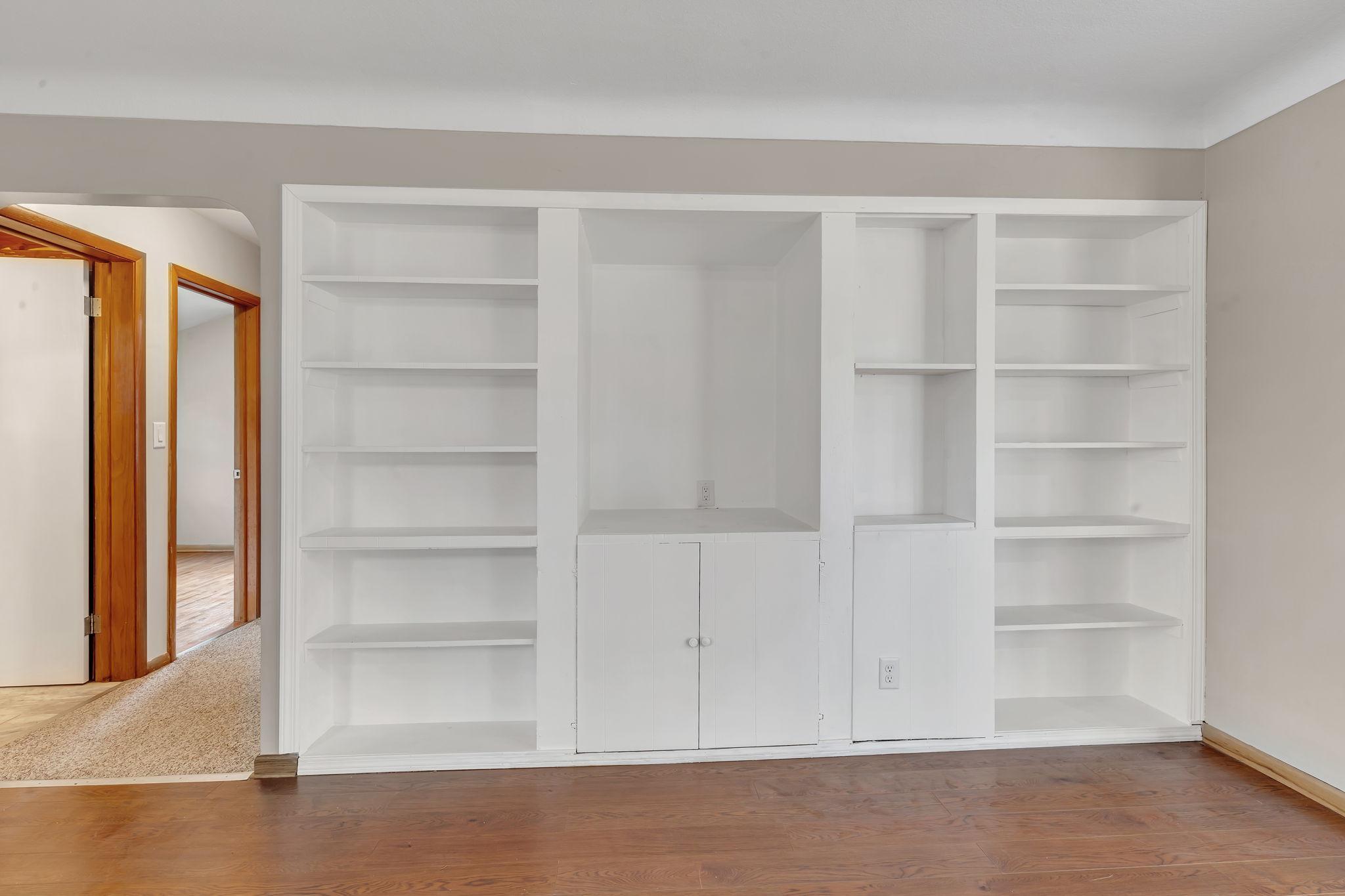 The built in cabinets in the dining area provide extra storage for dishes, books, games and all those things we collect through the years.