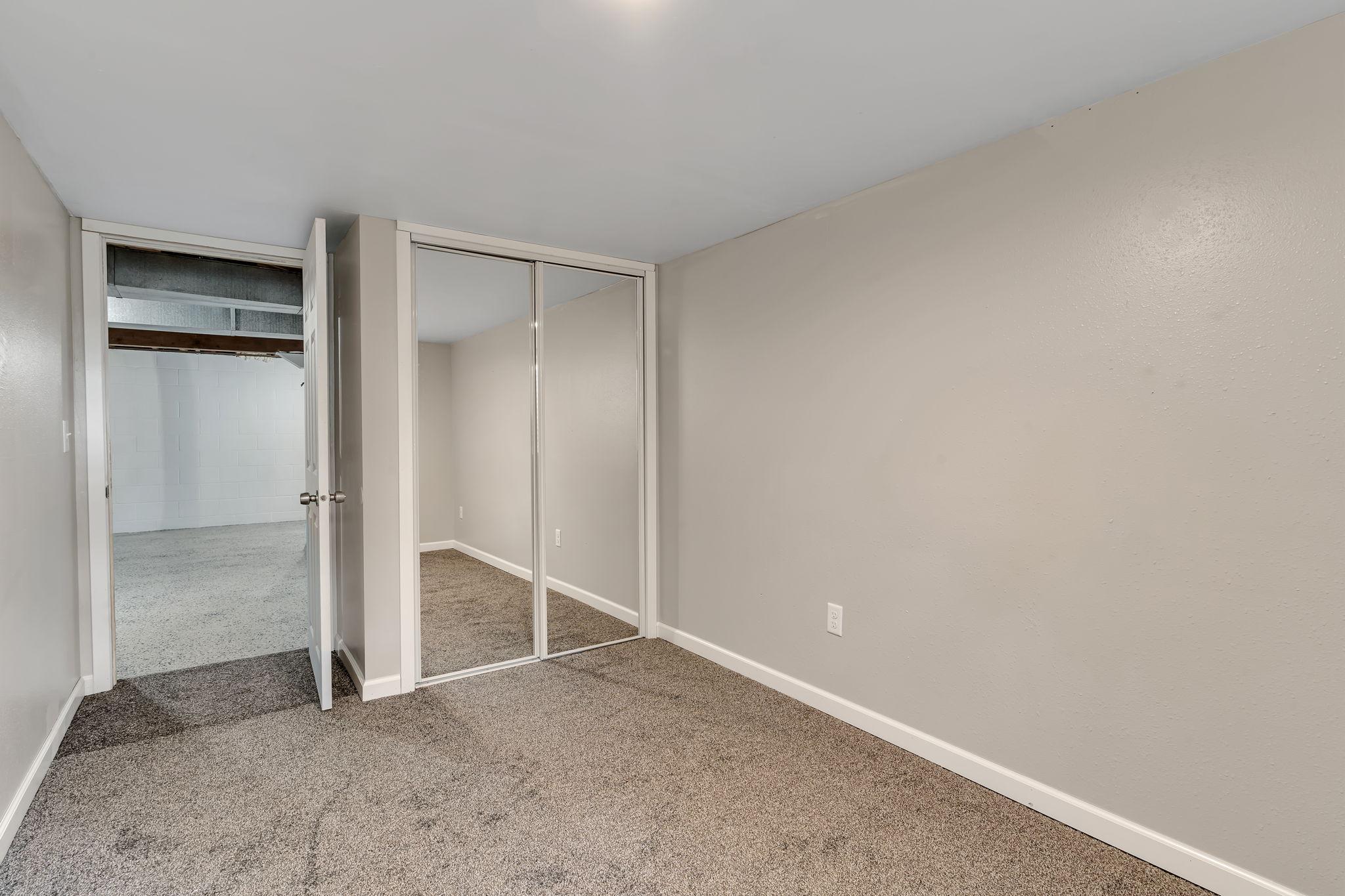 3rd of 4 bedrooms is located in the basement.