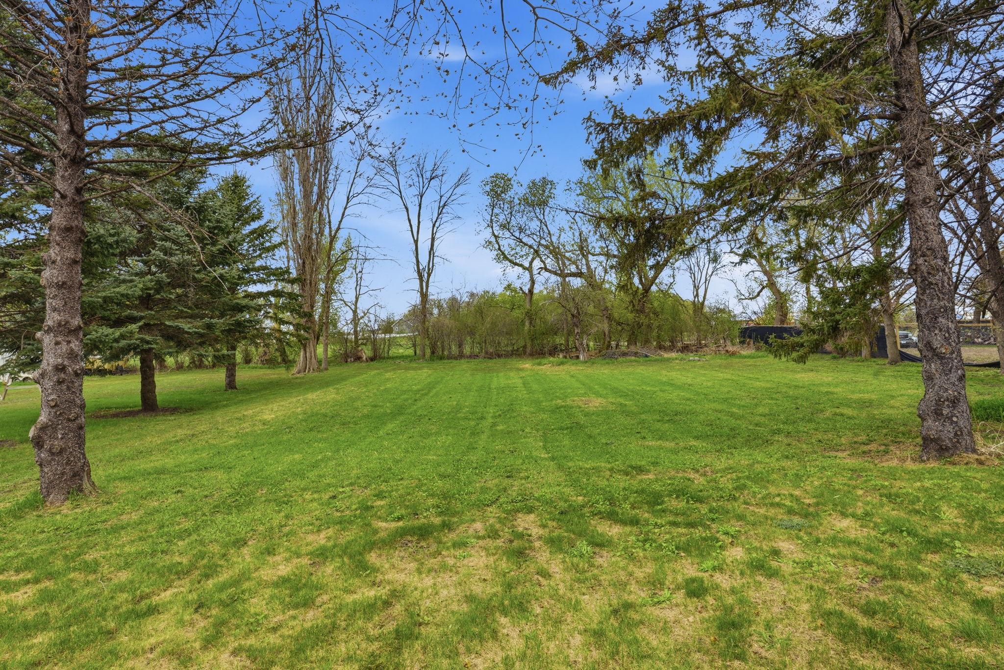 If gardening is your hobby - this yard has plenty of space for that and still have room to roam.