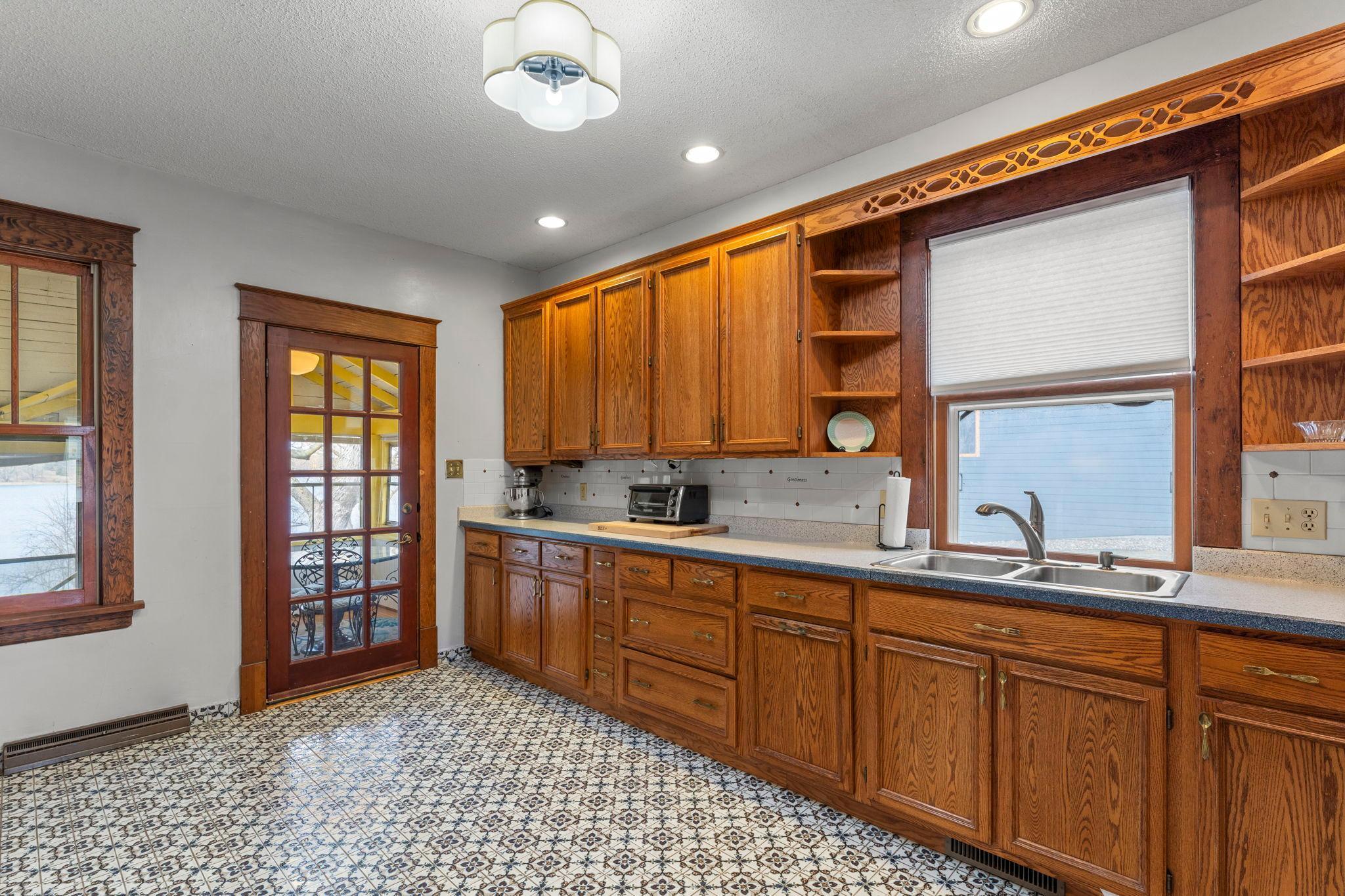 Bright kitchen with beautiful tile flooring
