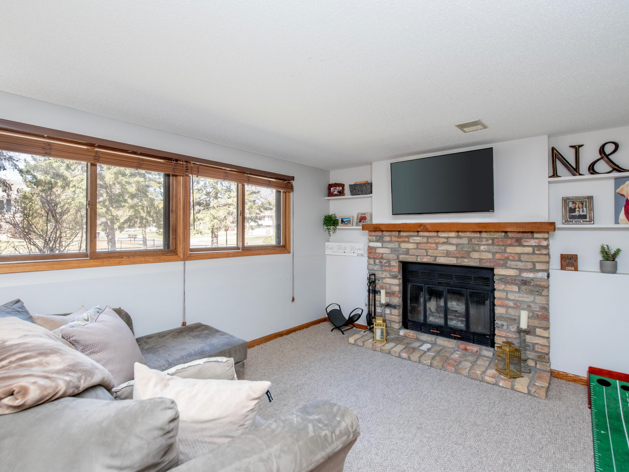 Family Room with a wood burning fireplace