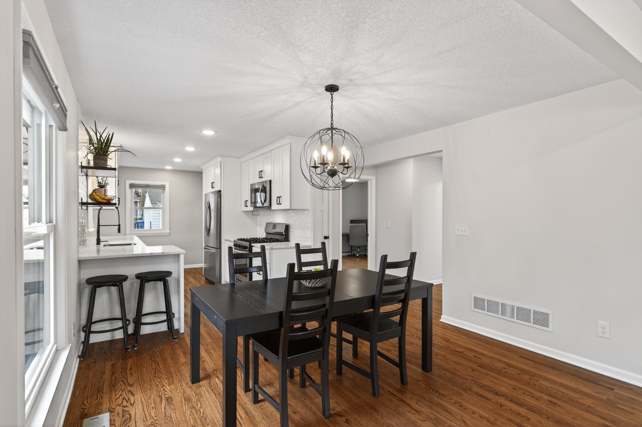 Large dining room with breakfast bar.