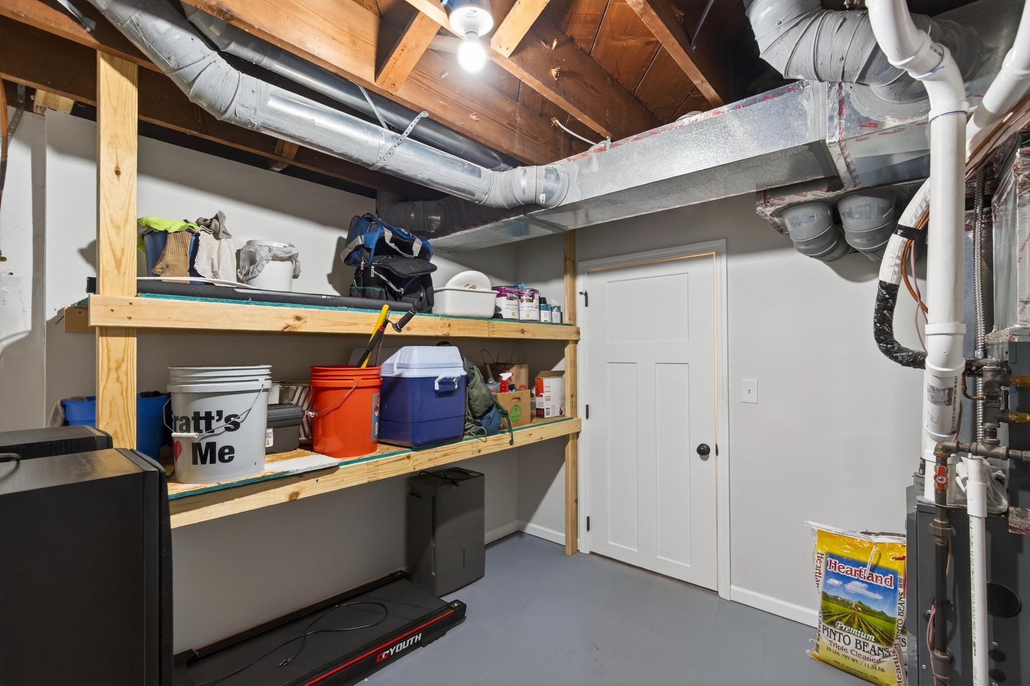 Built-in storage in mechanical room.