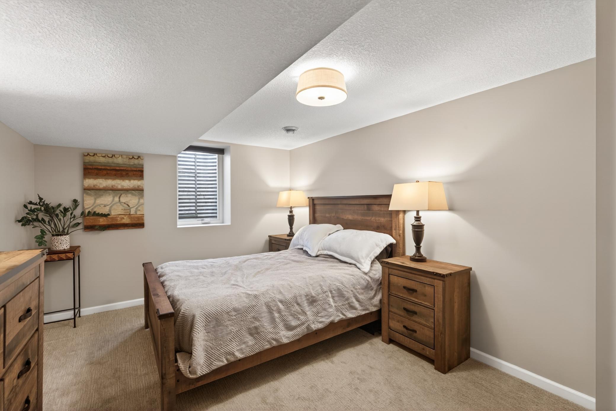 Basement guest suite with walk-through bath.