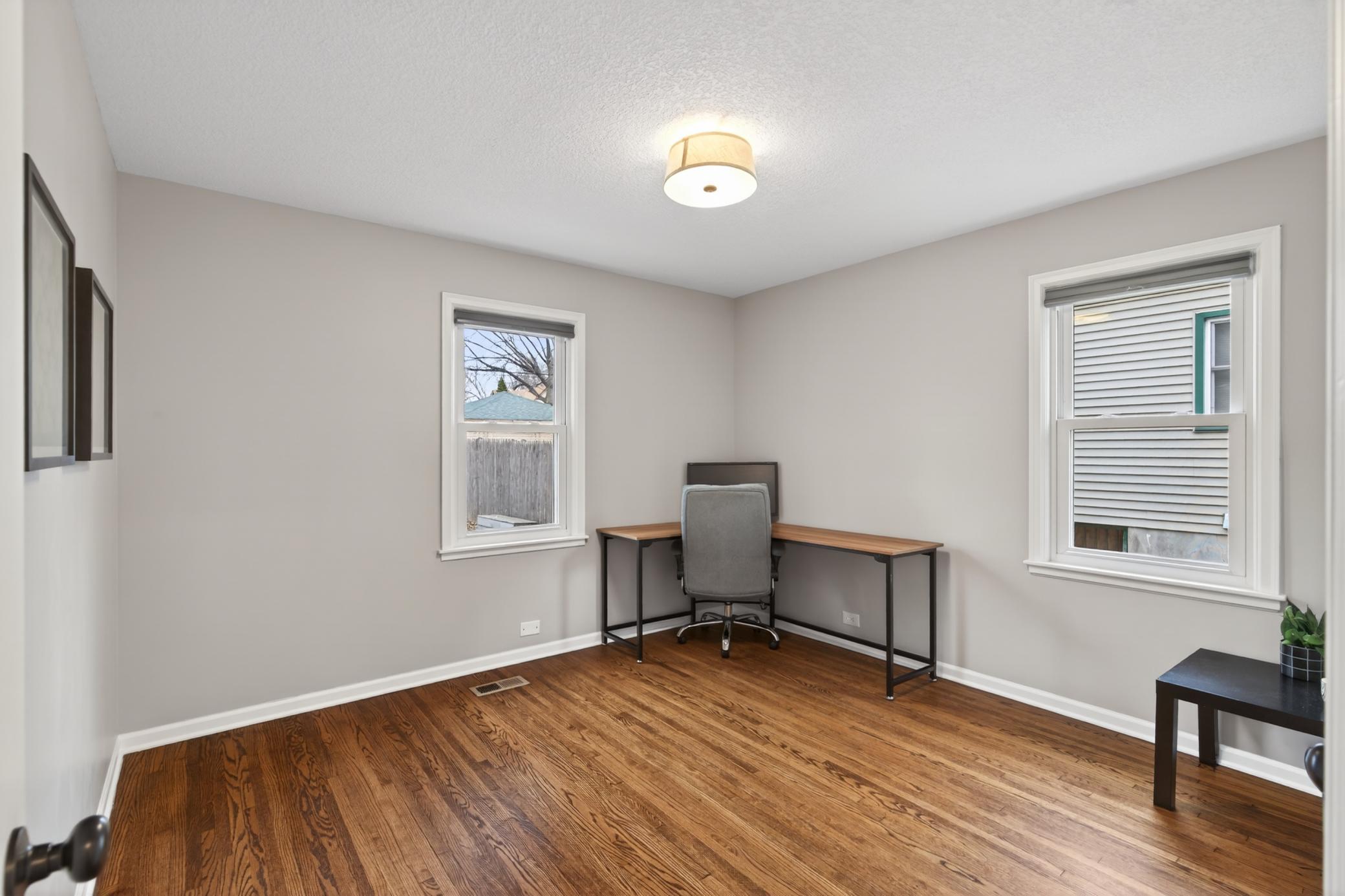 2nd main floor bedroom currently being used as a home office.