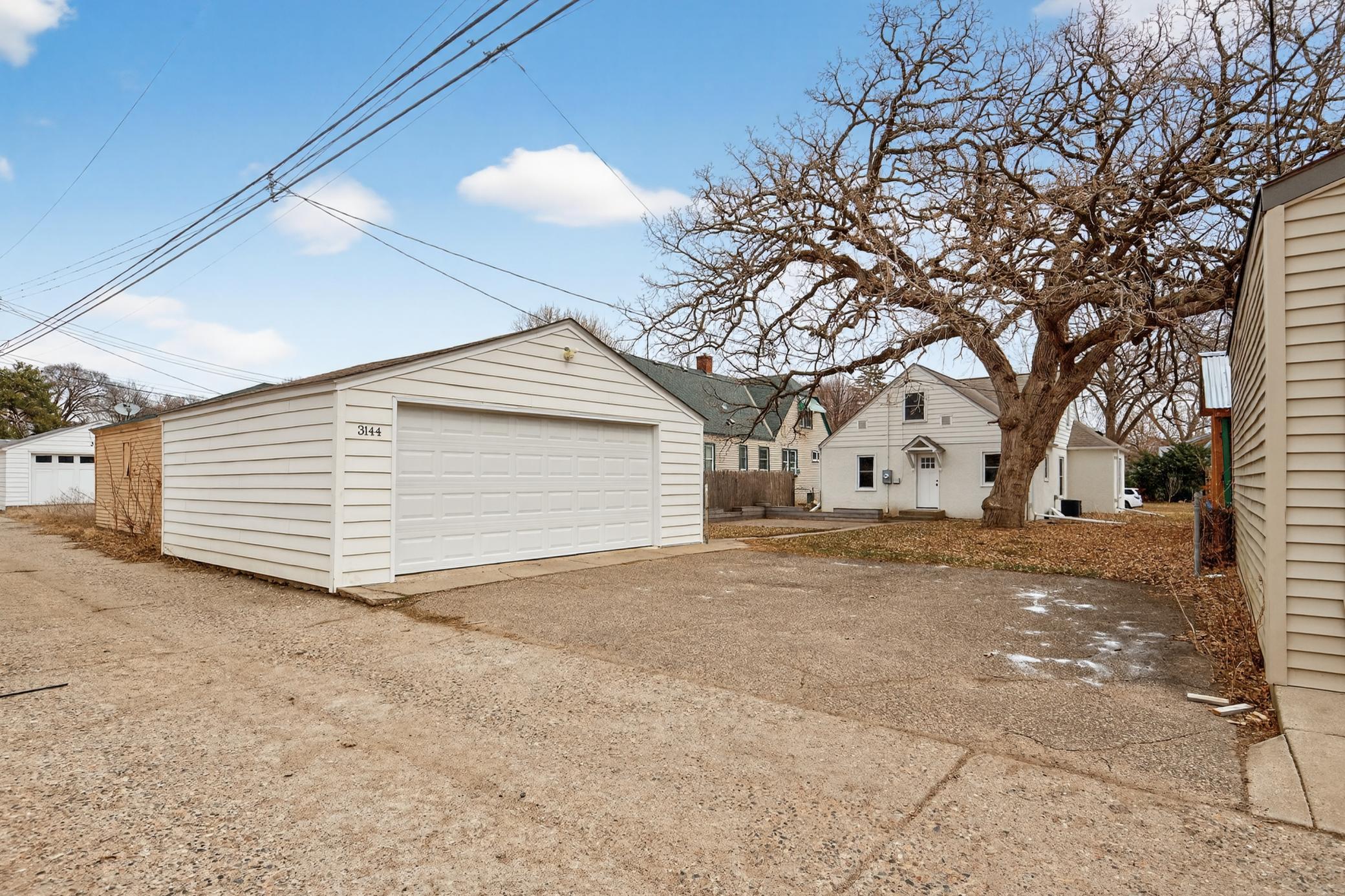 2-stall garage and concrete driveway