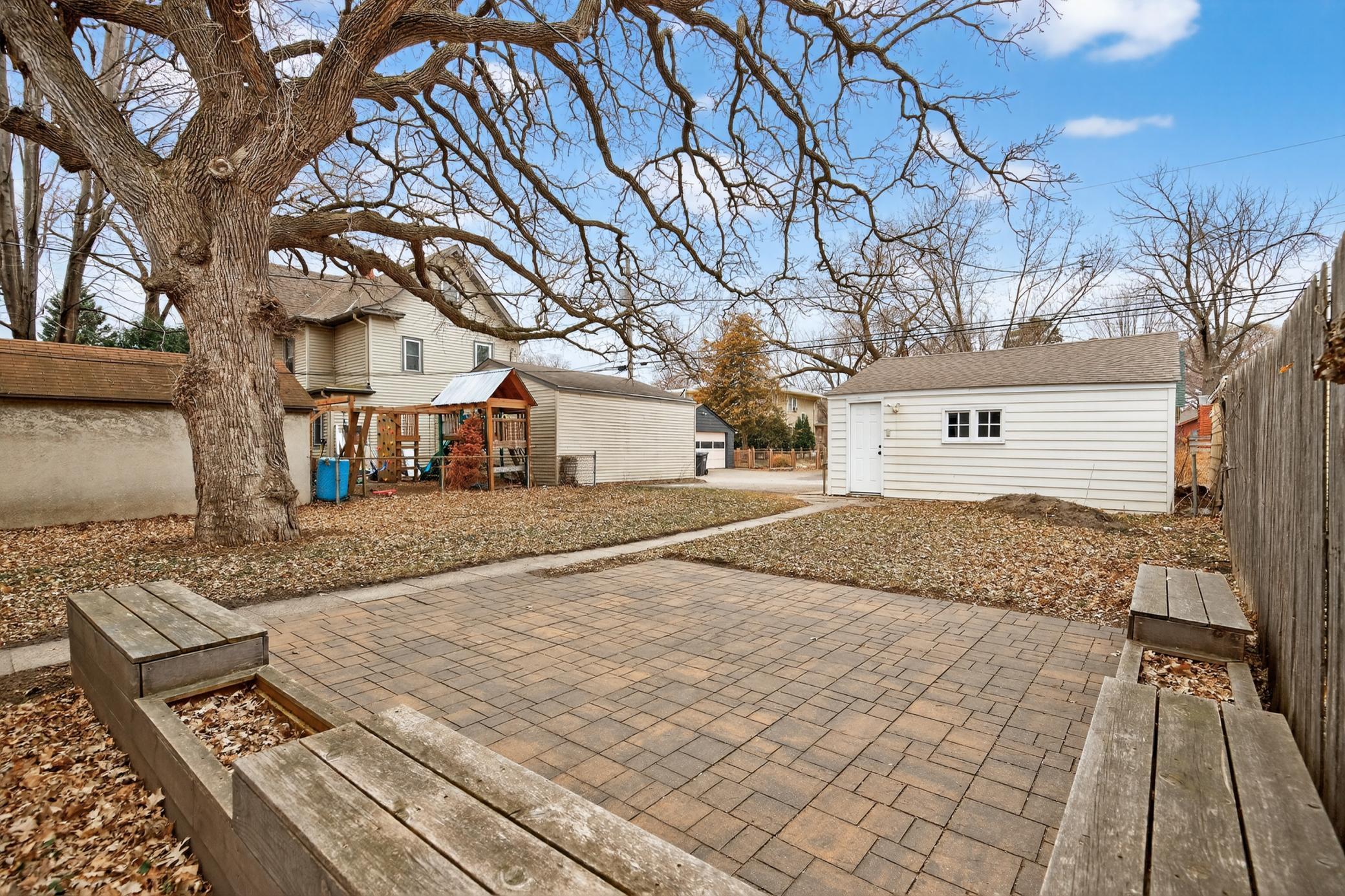 Paver patio with flower beds