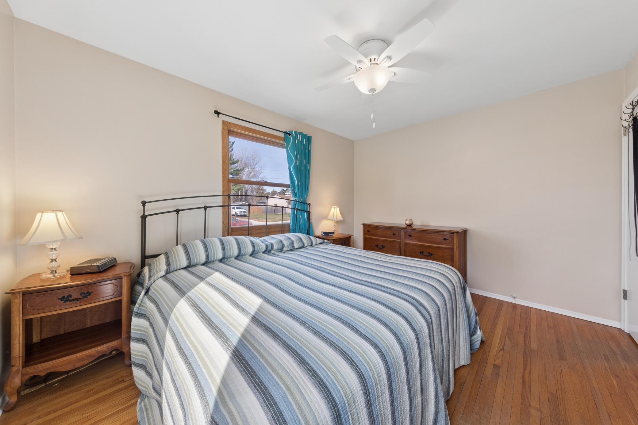 Primary bedroom easily fits a King Size bed