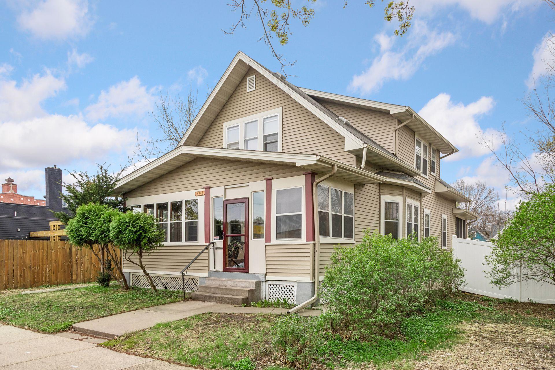 This inviting exterior welcomes you home with both an enclosed front porch and a screened-in back porch, offering multiple spaces to relax and unwind.