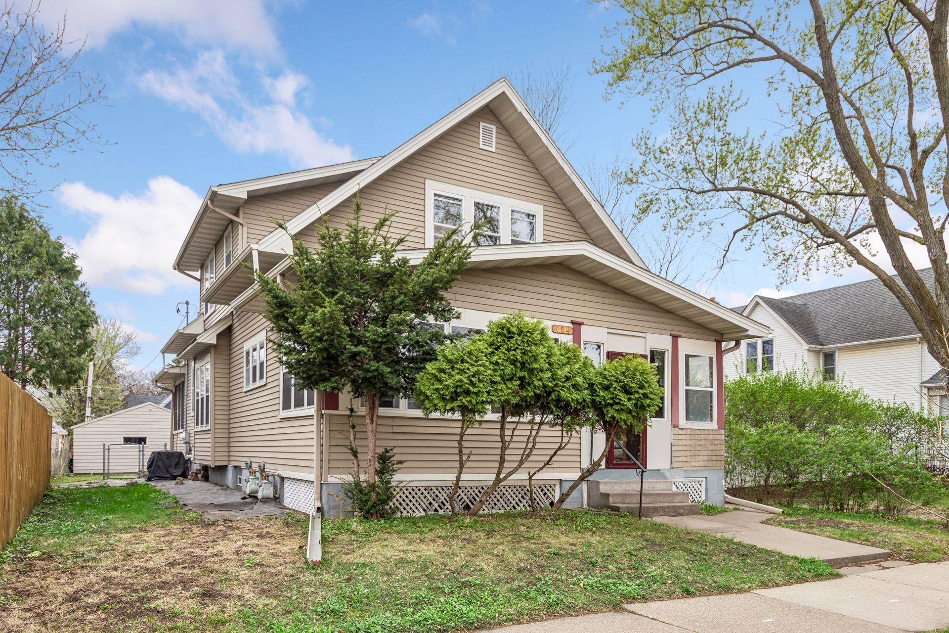 This inviting exterior welcomes you home with both an enclosed front porch and a screened-in back porch, offering multiple spaces to relax and unwind.