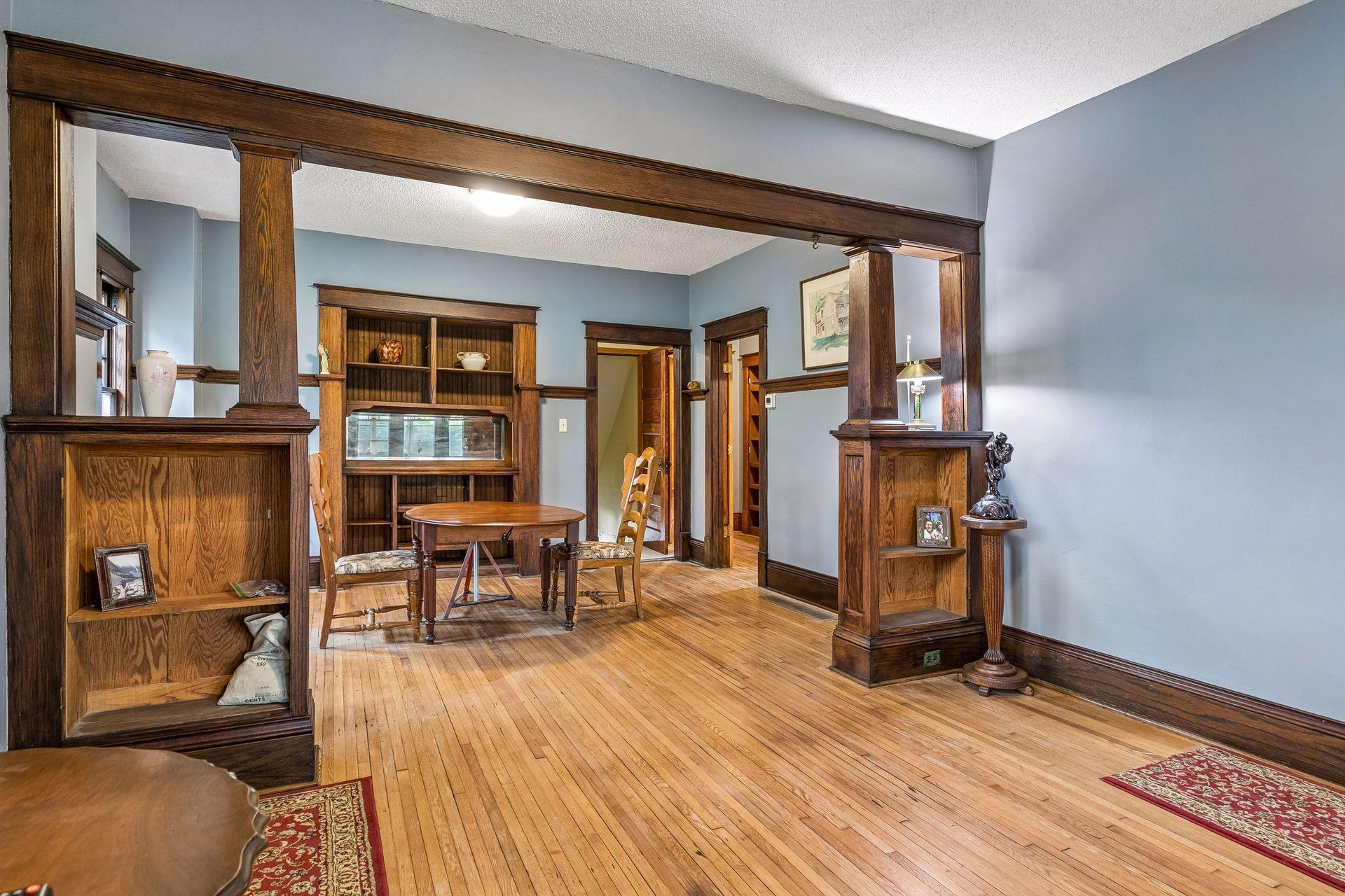 The main floor unit features a spacious living and dining area, ideal for gathering and entertaining.