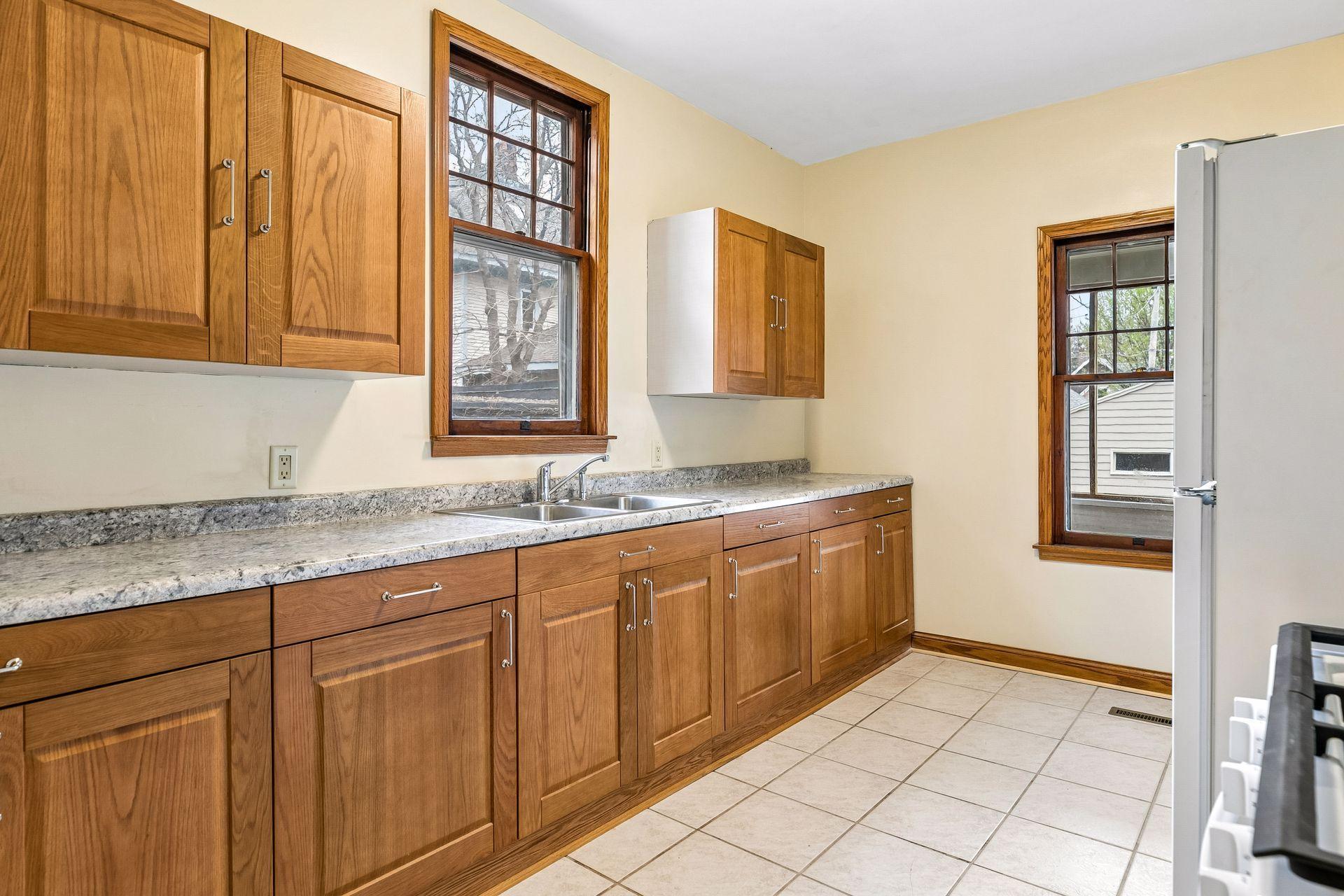 The main floor kitchen has been updated to offer a clean and functional space.