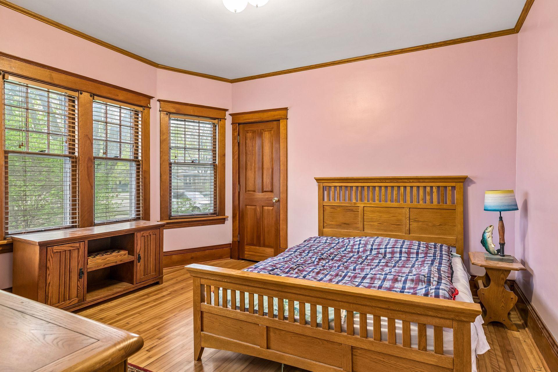The main floor features a generously sized primary bedroom.