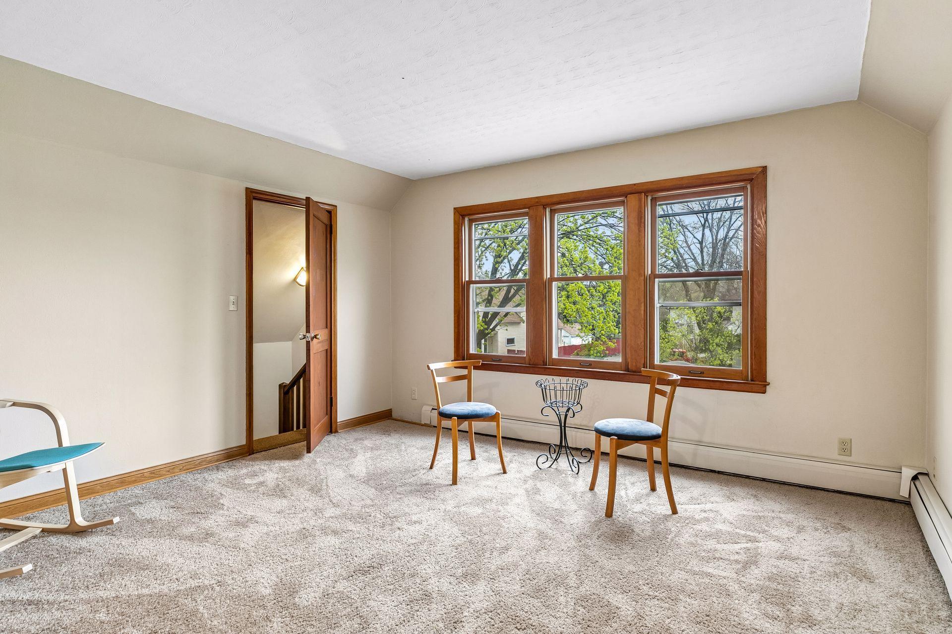 This space is filled with natural light and includes baseboard heating for year-round comfort.