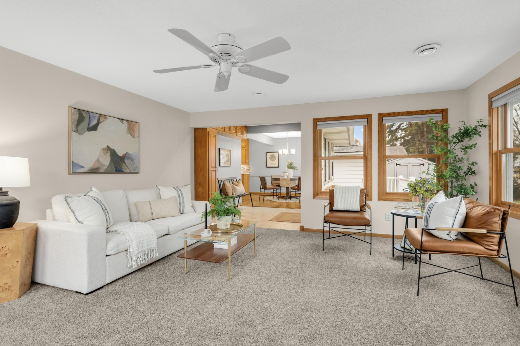 Beautiful family room area with lots of windows for more natural light