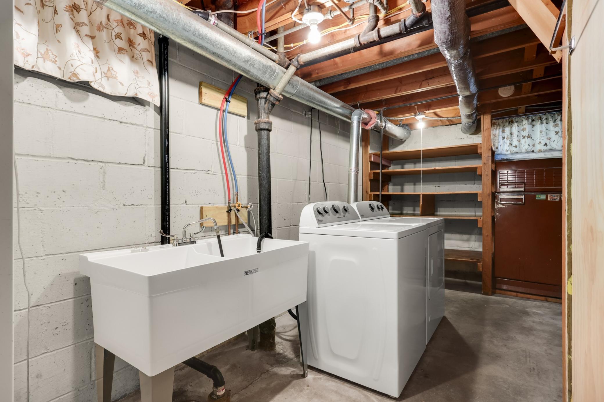 Laundry room with utility sink