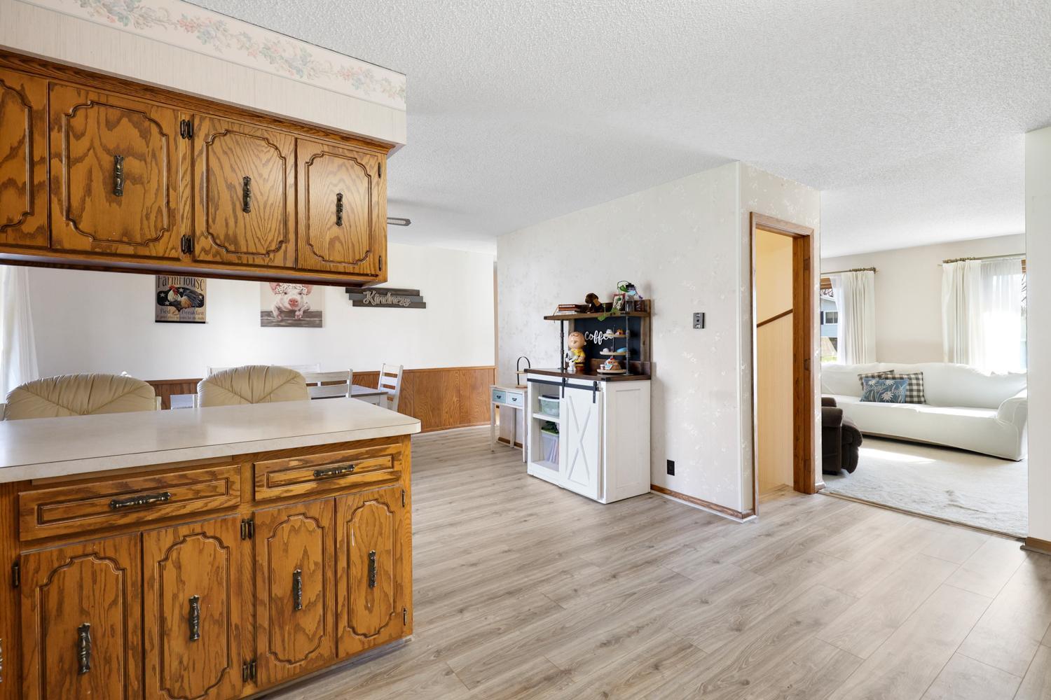 Open kitchen and dining layout that brings everyone together, with direct access to the backyard for easy indoor outdoor living.