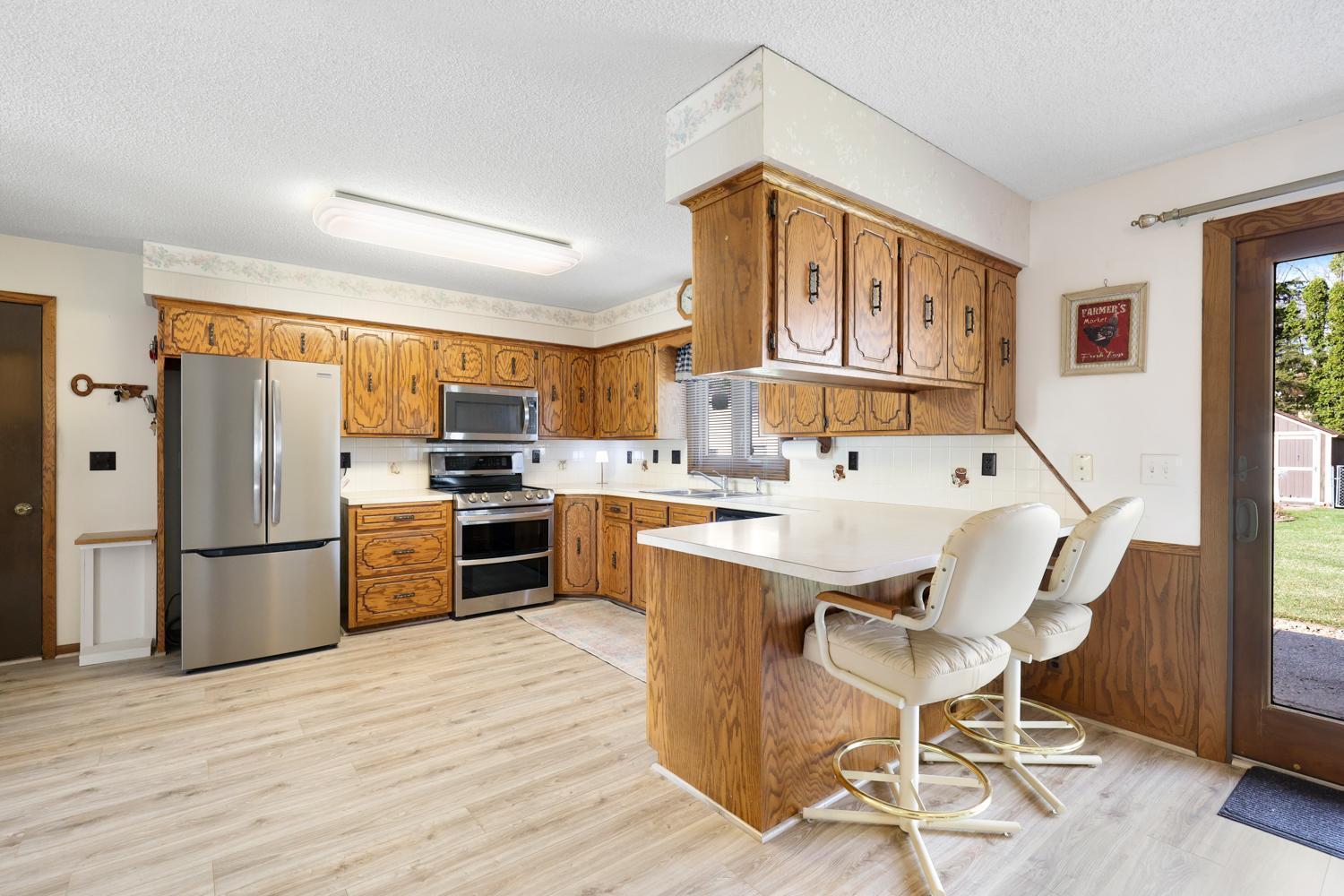 Warm and inviting kitchen with generous storage and an open dining area that makes entertaining feel effortless.