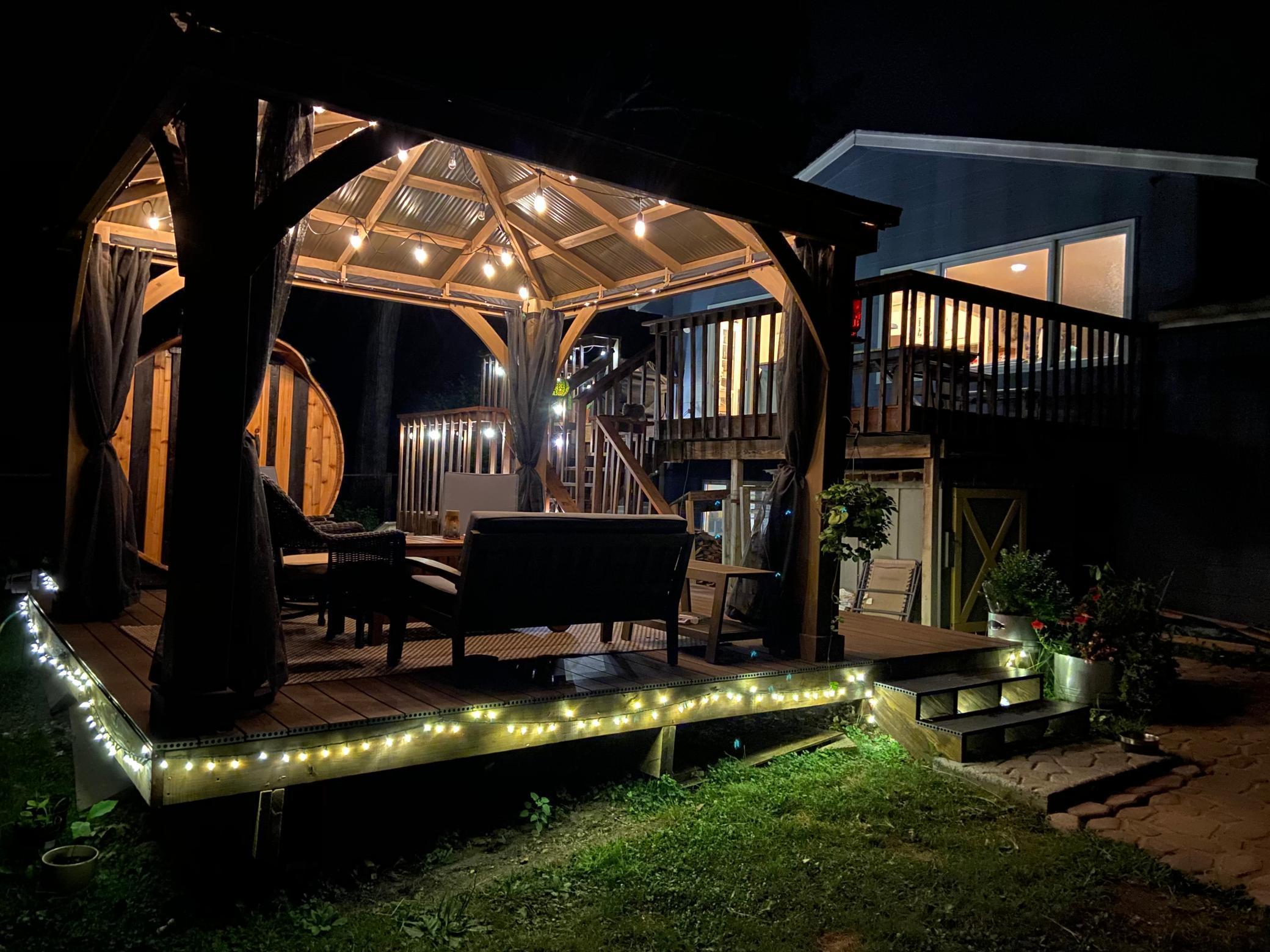 Covered Deck leads into outdoor sauna.