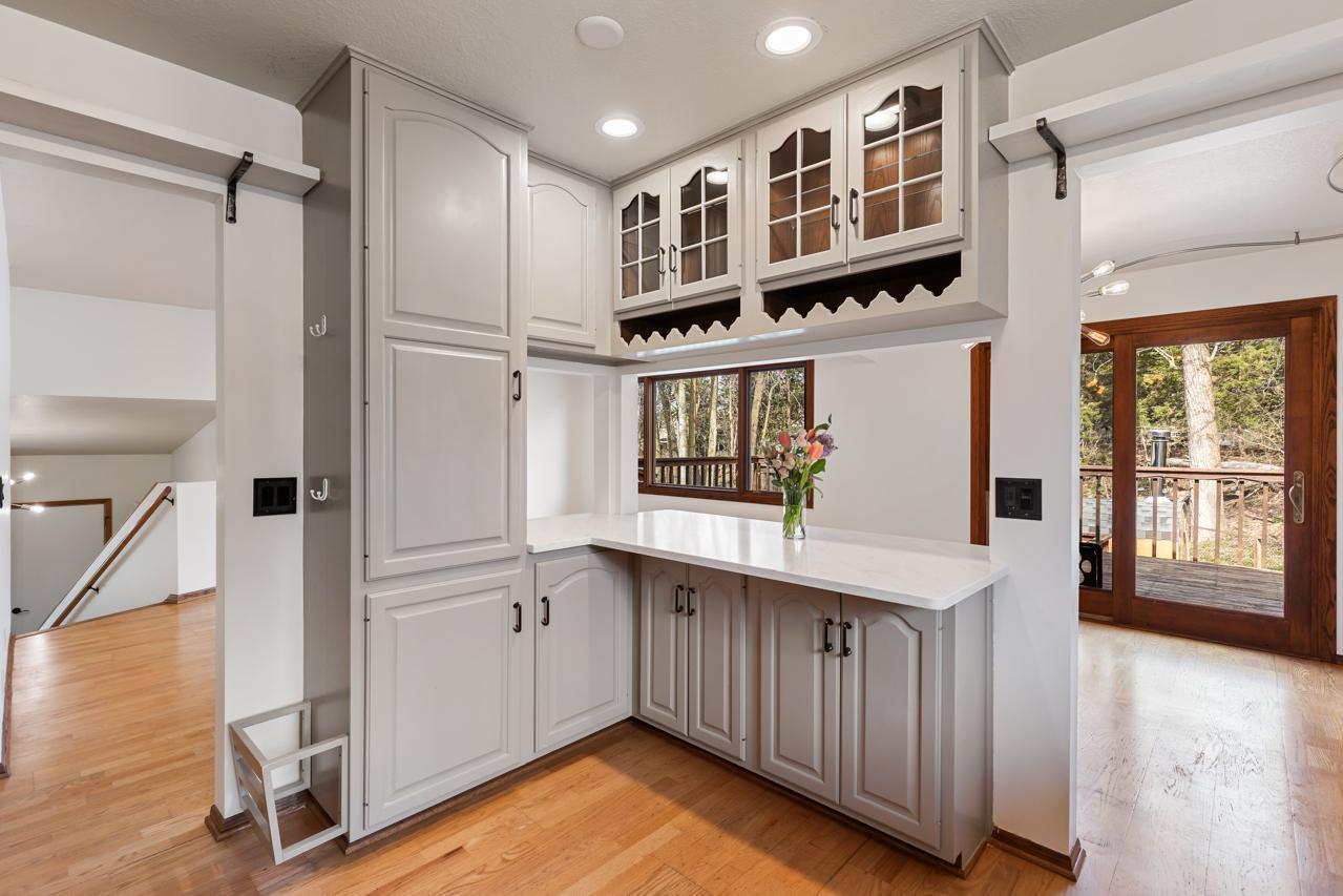 Kitchen open to dining and living rooms.