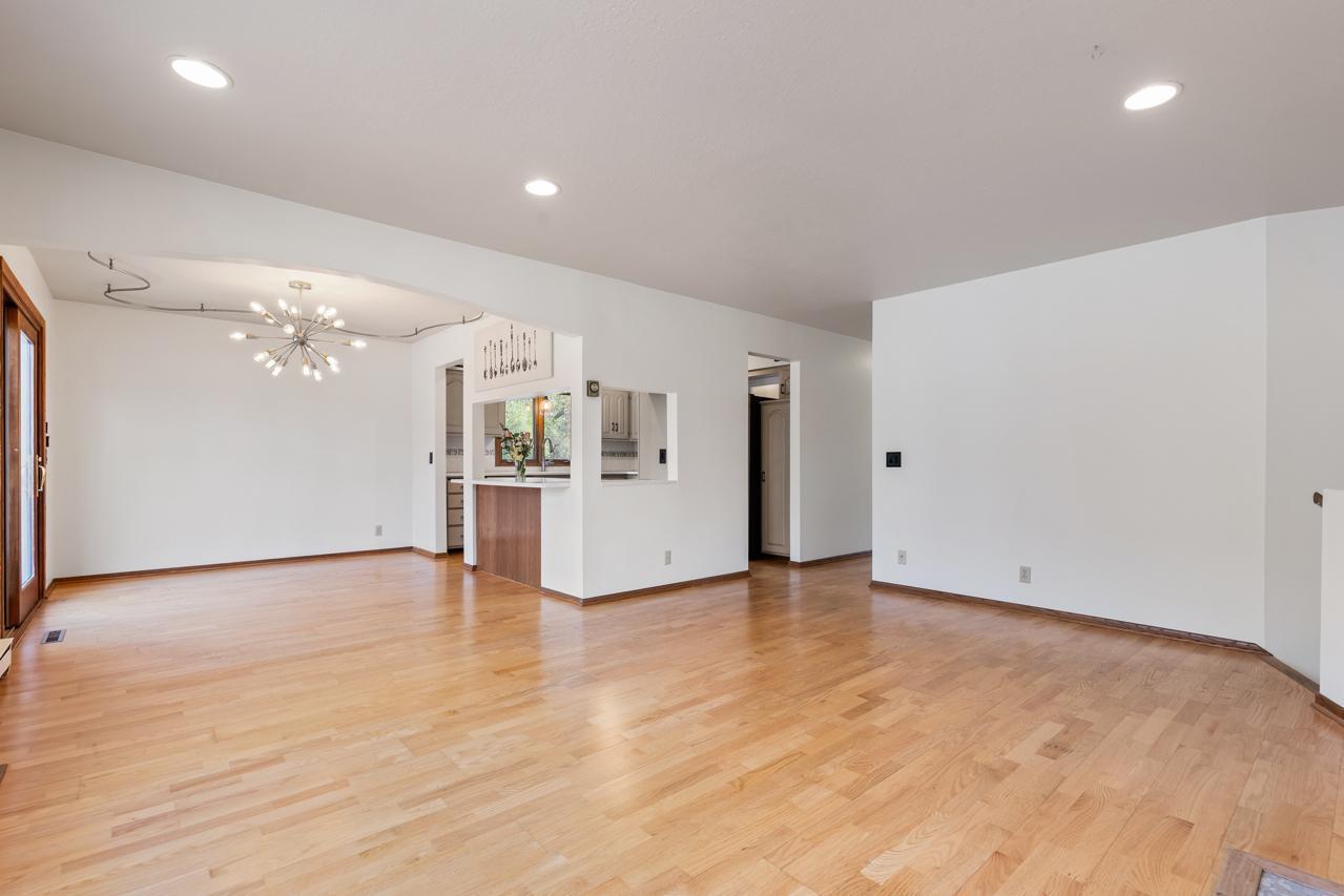 Living and Dining Rooms. An extended counter from the kitchen is perfect for breakfast bar