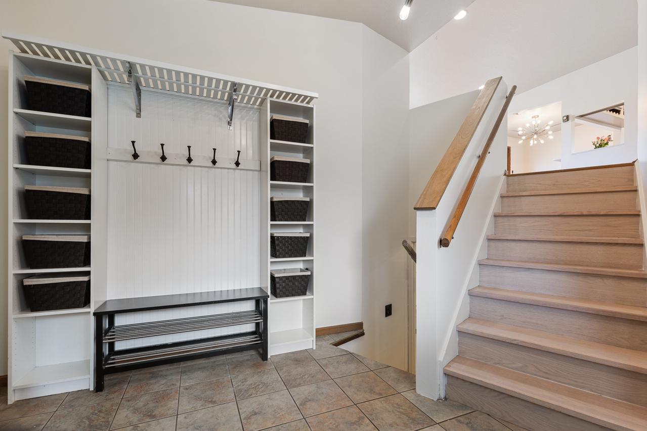 Convenient storage in the foyer off the garage and front door to keep things organized.