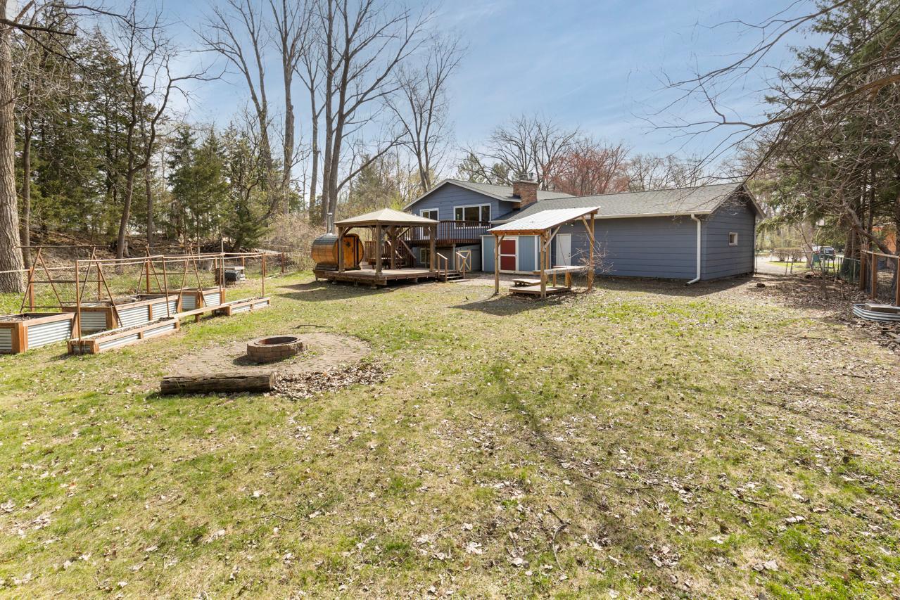 Raised gardens and a fire pit.