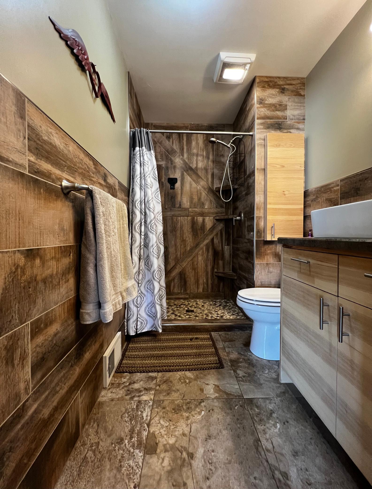 Main floor 3/4 Bathroom Beautiful Tile