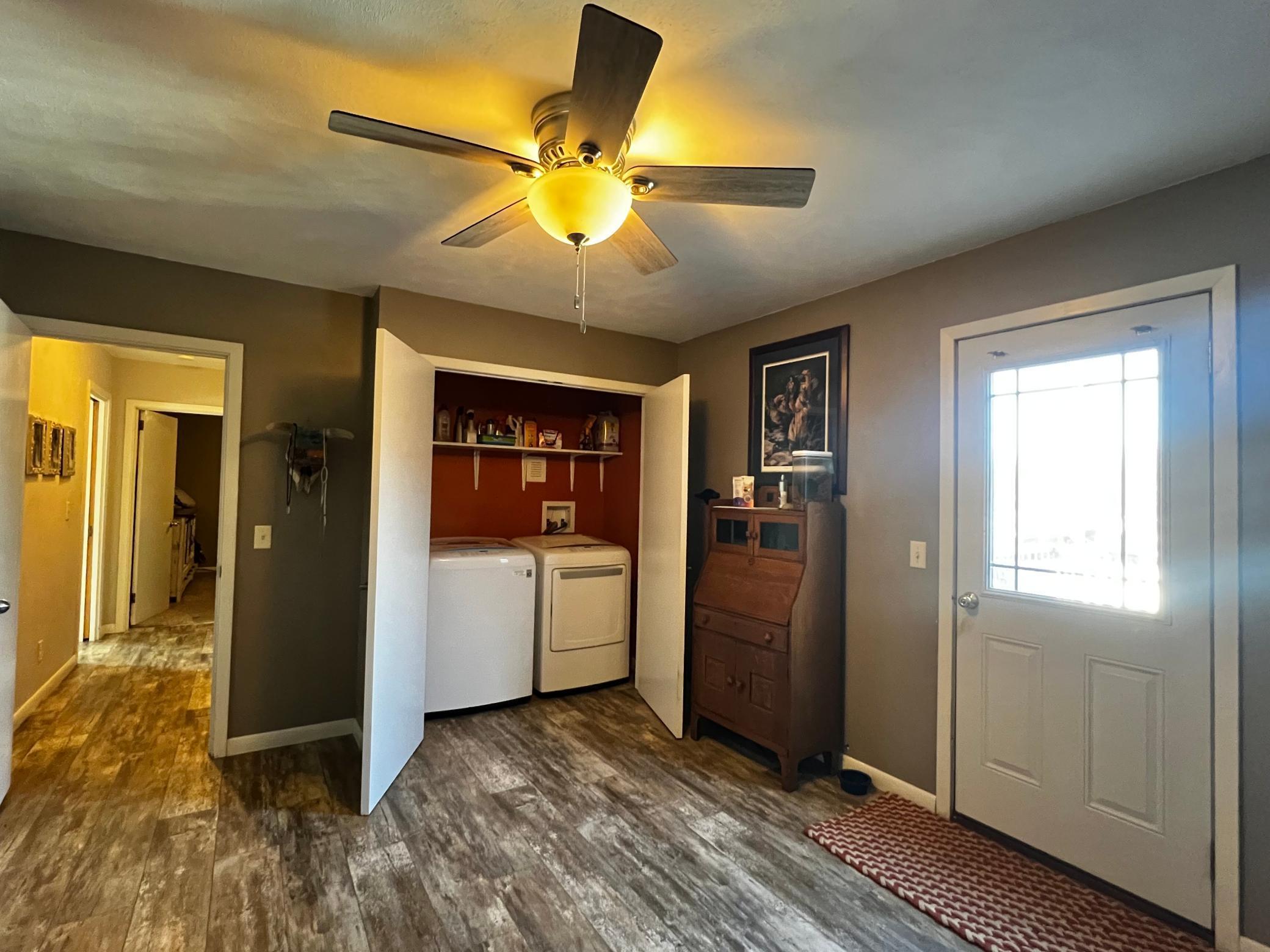 Main Floor Bonus Room with Laundry Closet, Door to Deck and Backyard