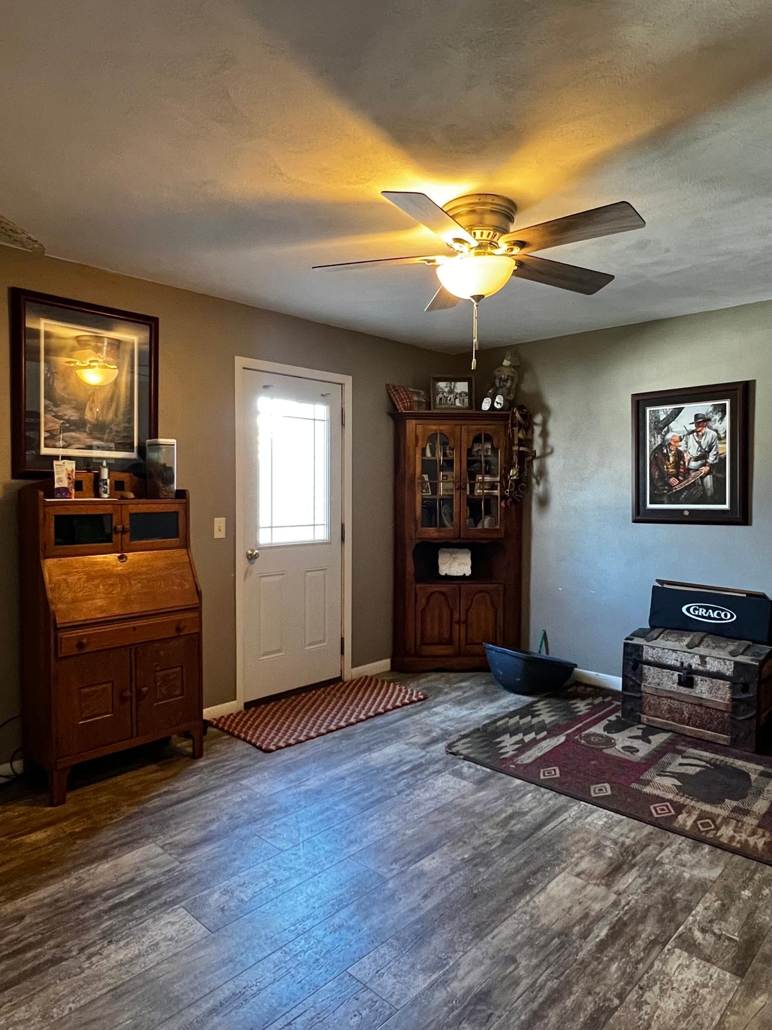 Main Floor Bonus Room with Laundry Closet, Door to Deck and Backyard
