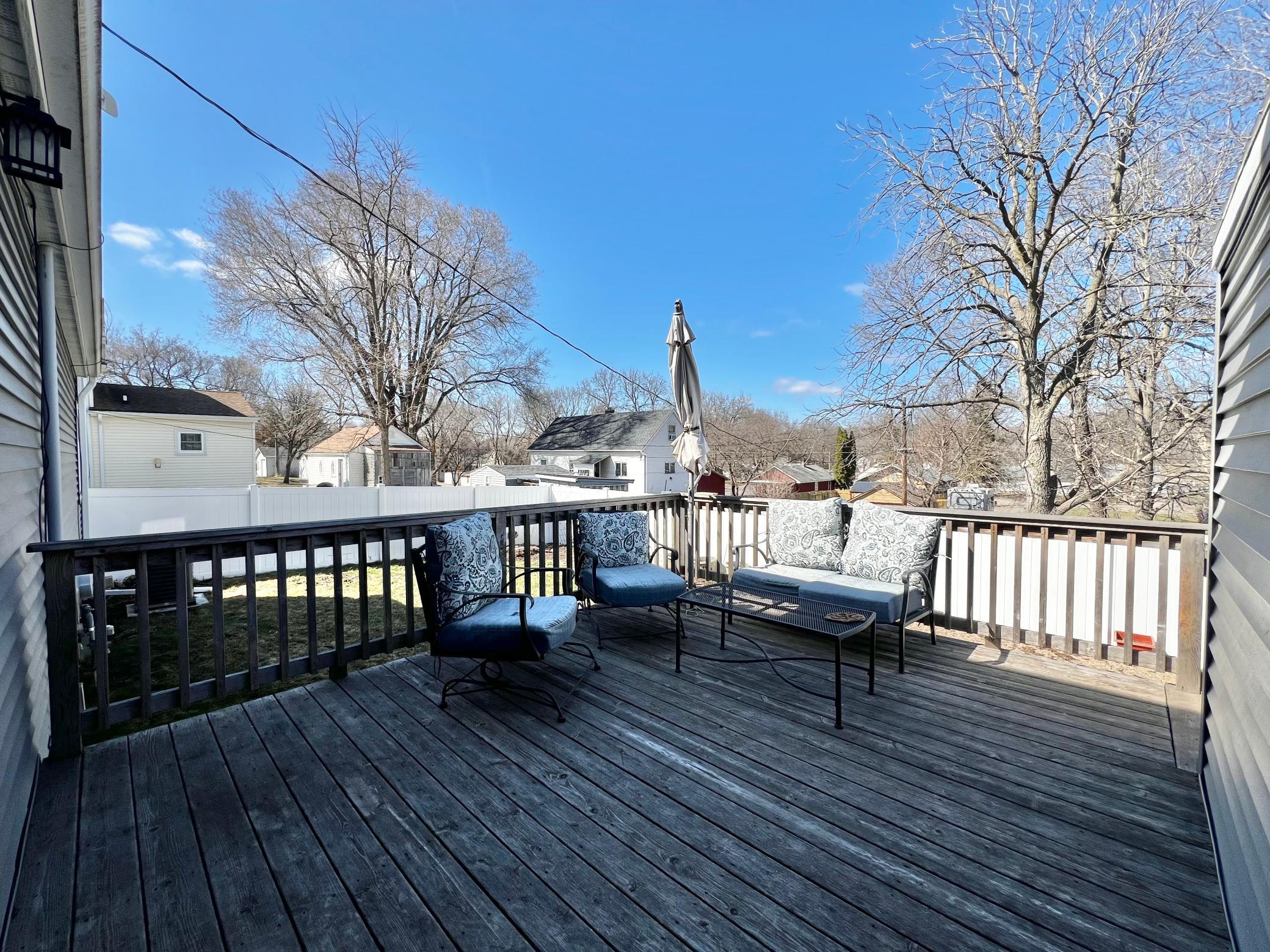 Deck over looking the Fenced in Backyard