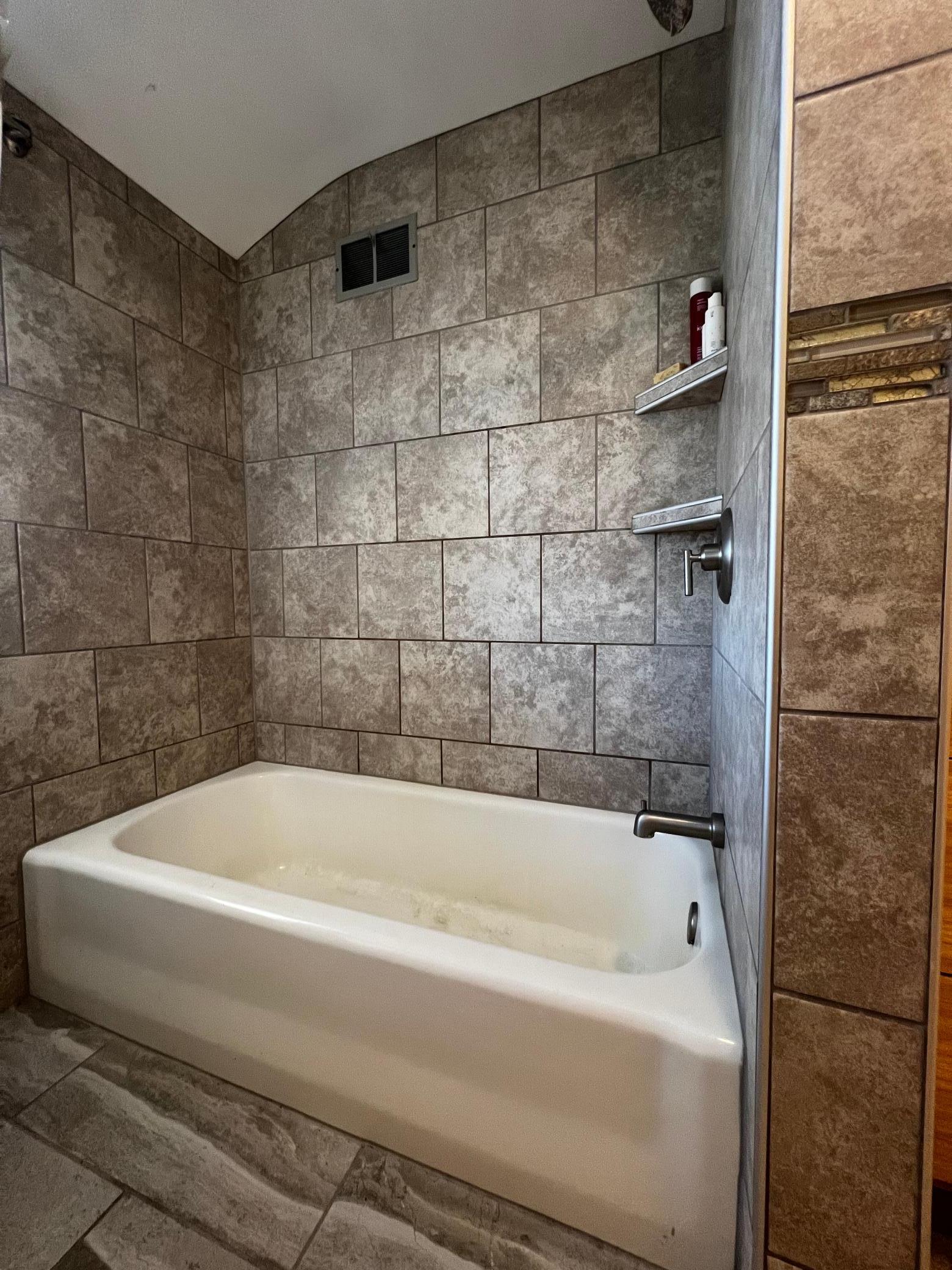 Beautifully Tiled Bathroom & Tub Surround!