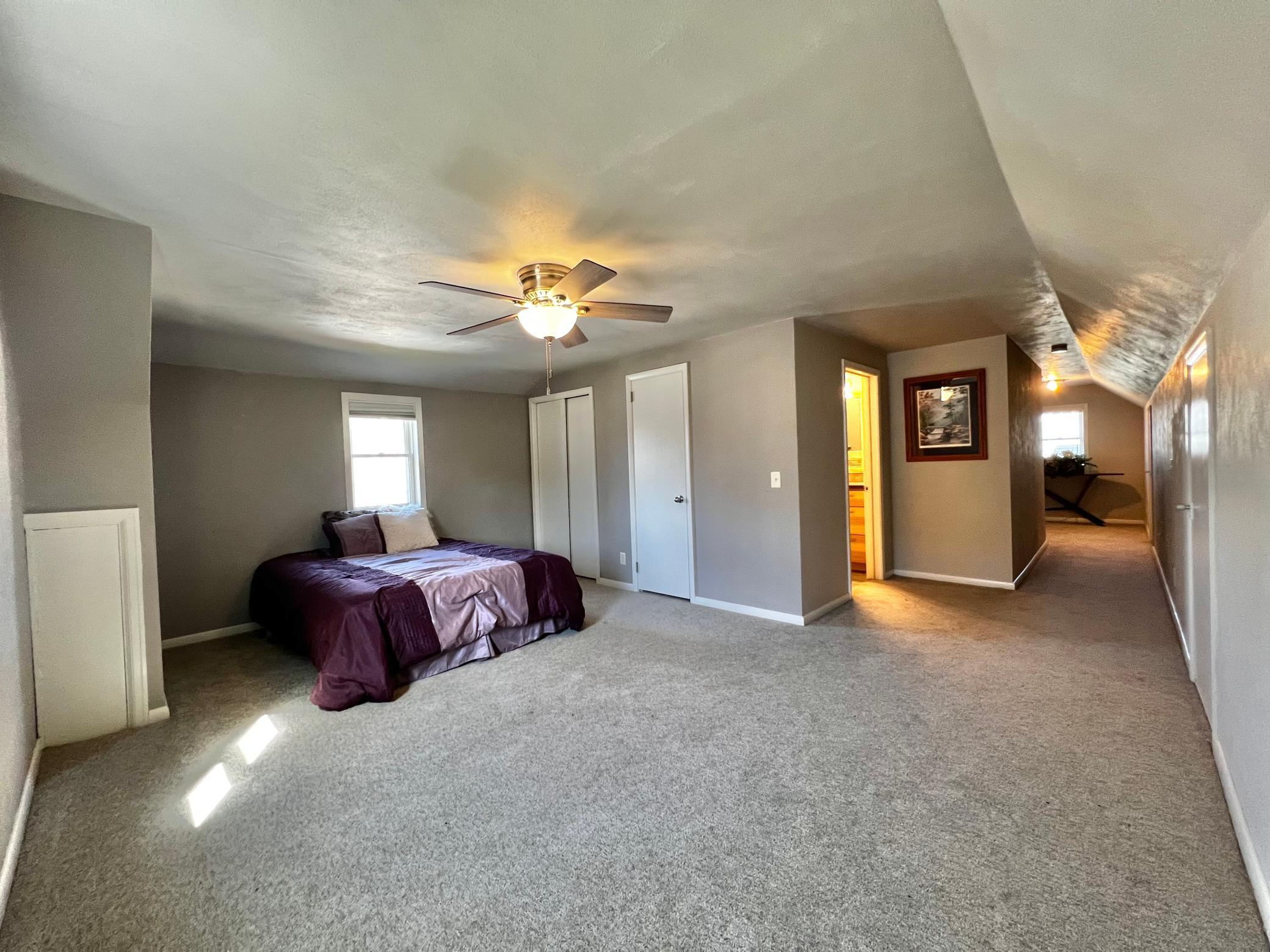 3rd Bedroom, Full Bathroom and view of the hallway.