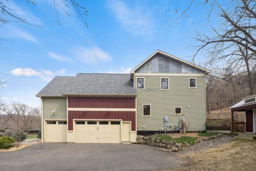 3 car garage. With heater and a 220V for electric car charge, and a loft for storage.