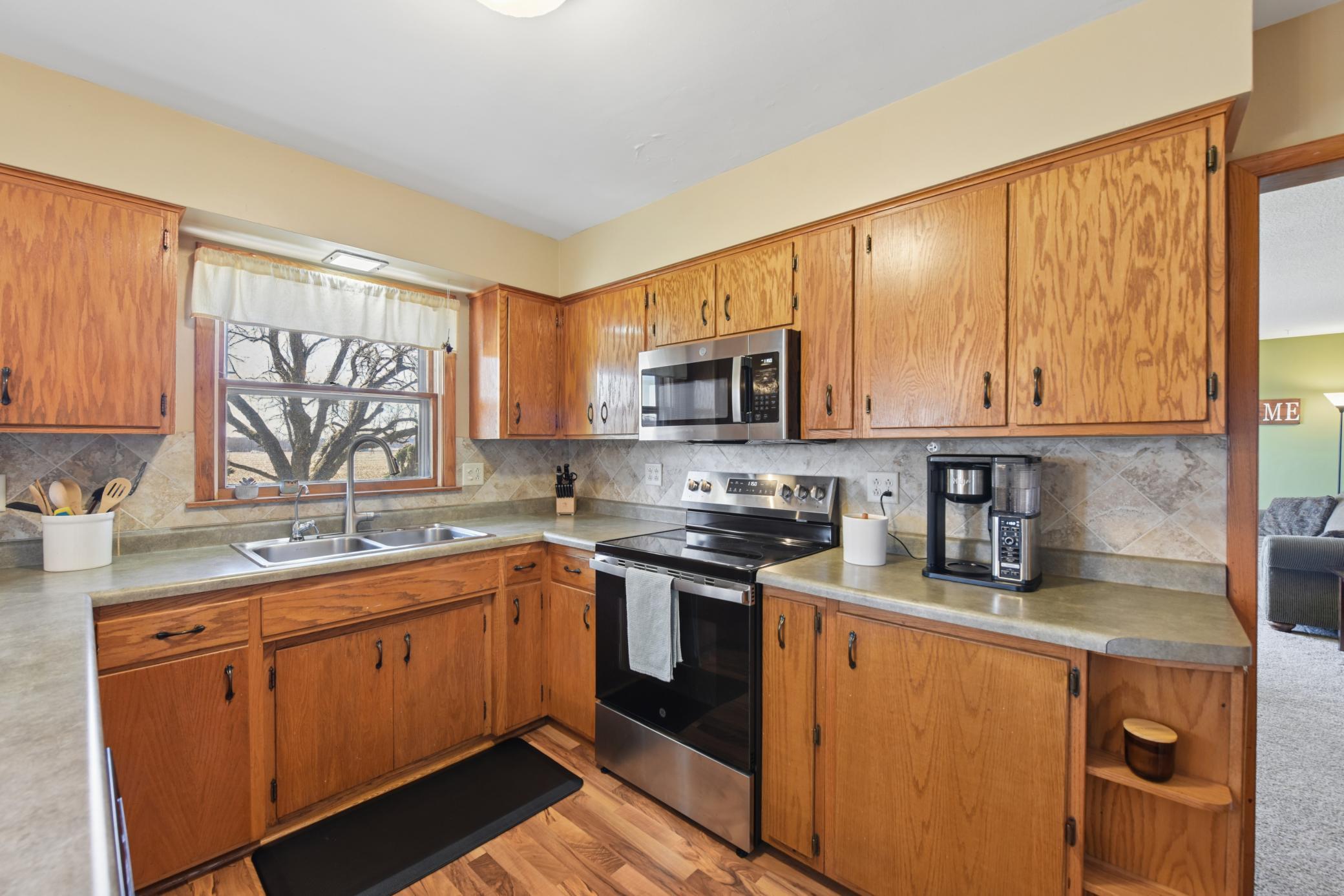 Very functional kitchen with an abundance of counter space.