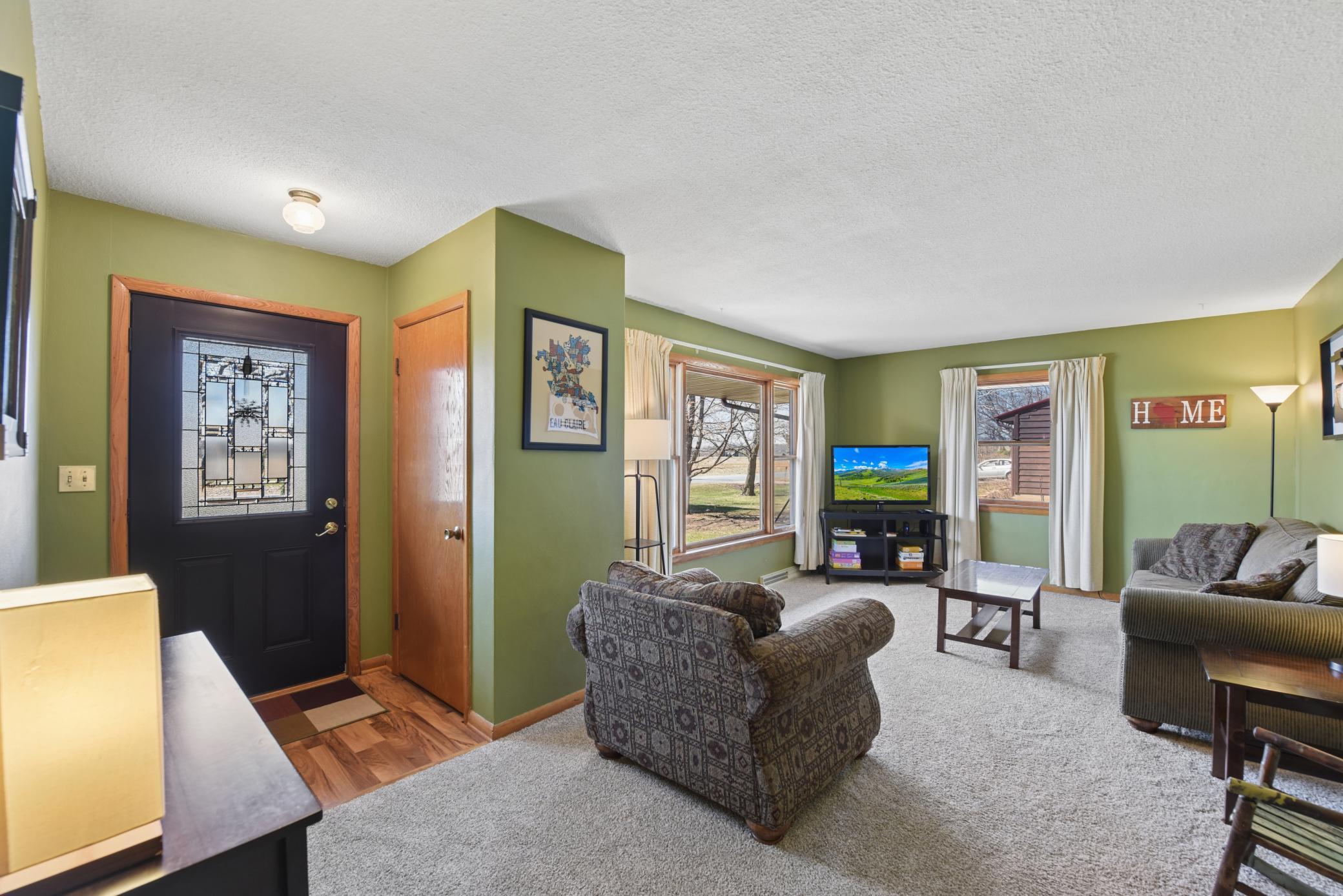 Cozy living room with lots of natural light.
