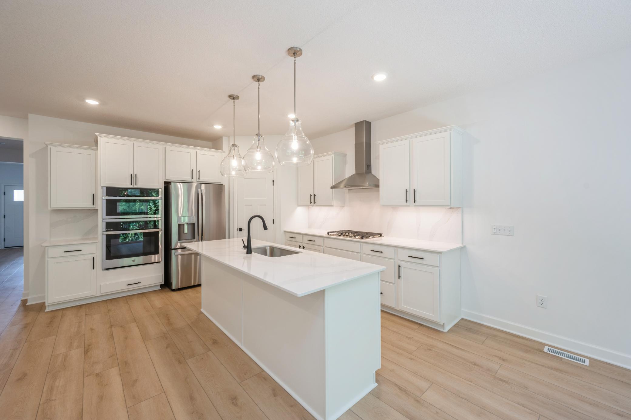 (All the following photos are of a similar home, actual finishes may vary.)