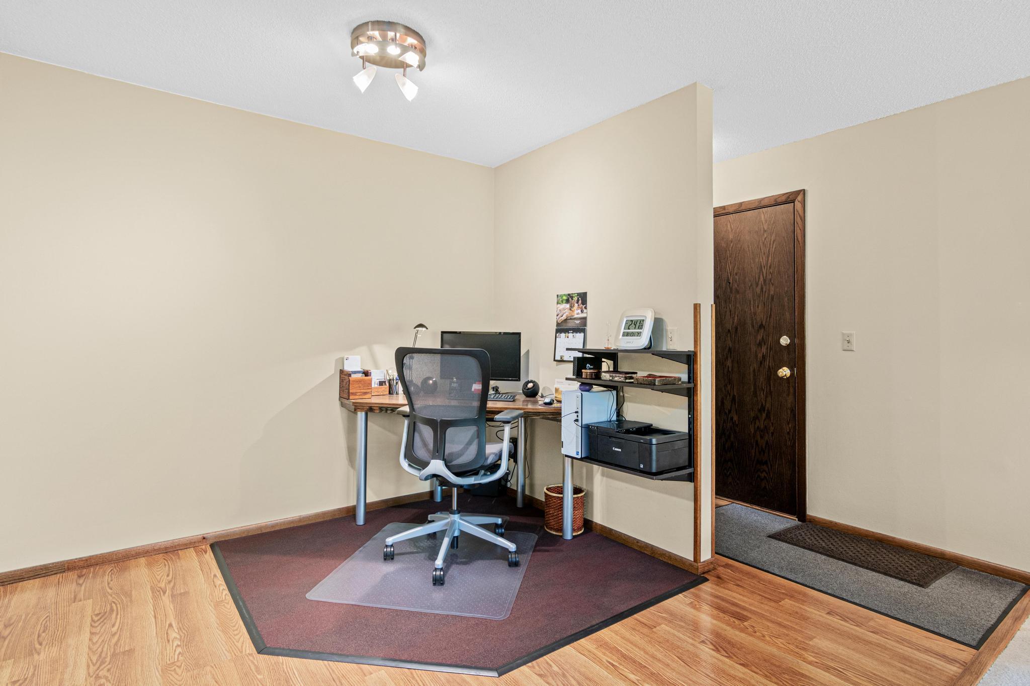 Very large dining space that currently is used as a home office with ample room to house a table and chairs as well!