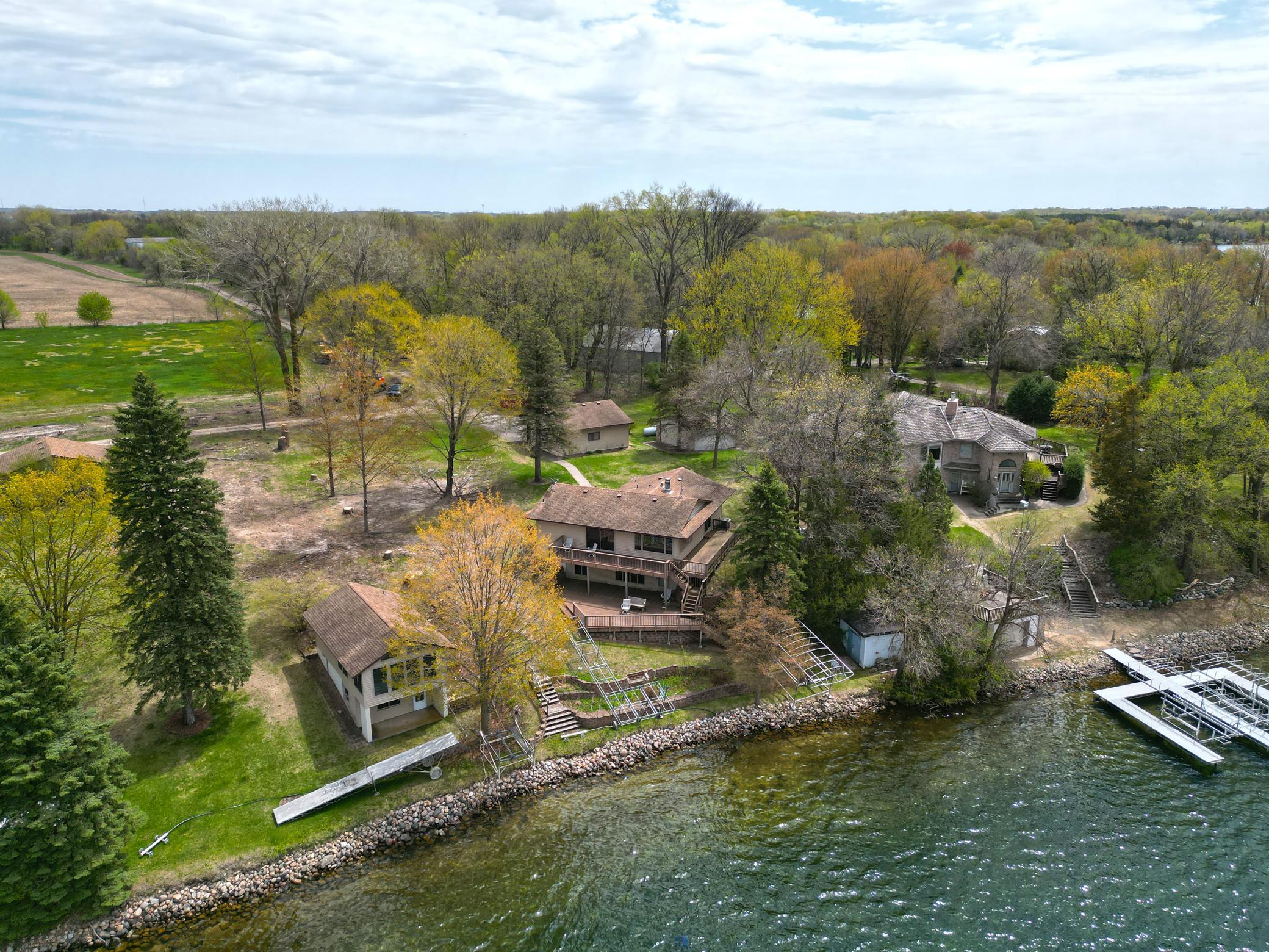 Set on .58 acres with a double detached garage and sprinkler system, this property offers the perfect blend of comfort, space, and lakefront living.