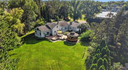WELCOME TO YOUR NEW LAKE OASIS. Huge deck and 3 season gazebo. BRAND NEW ROOF with architectural shingles. complete tear off 2025