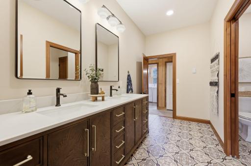 custom double vanity with hidden outlets for hair tools