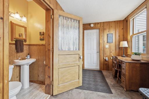handy powder room in the mudroom off garage