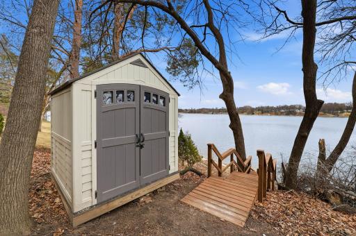 another shed conveniently located by the lake to store beach toys